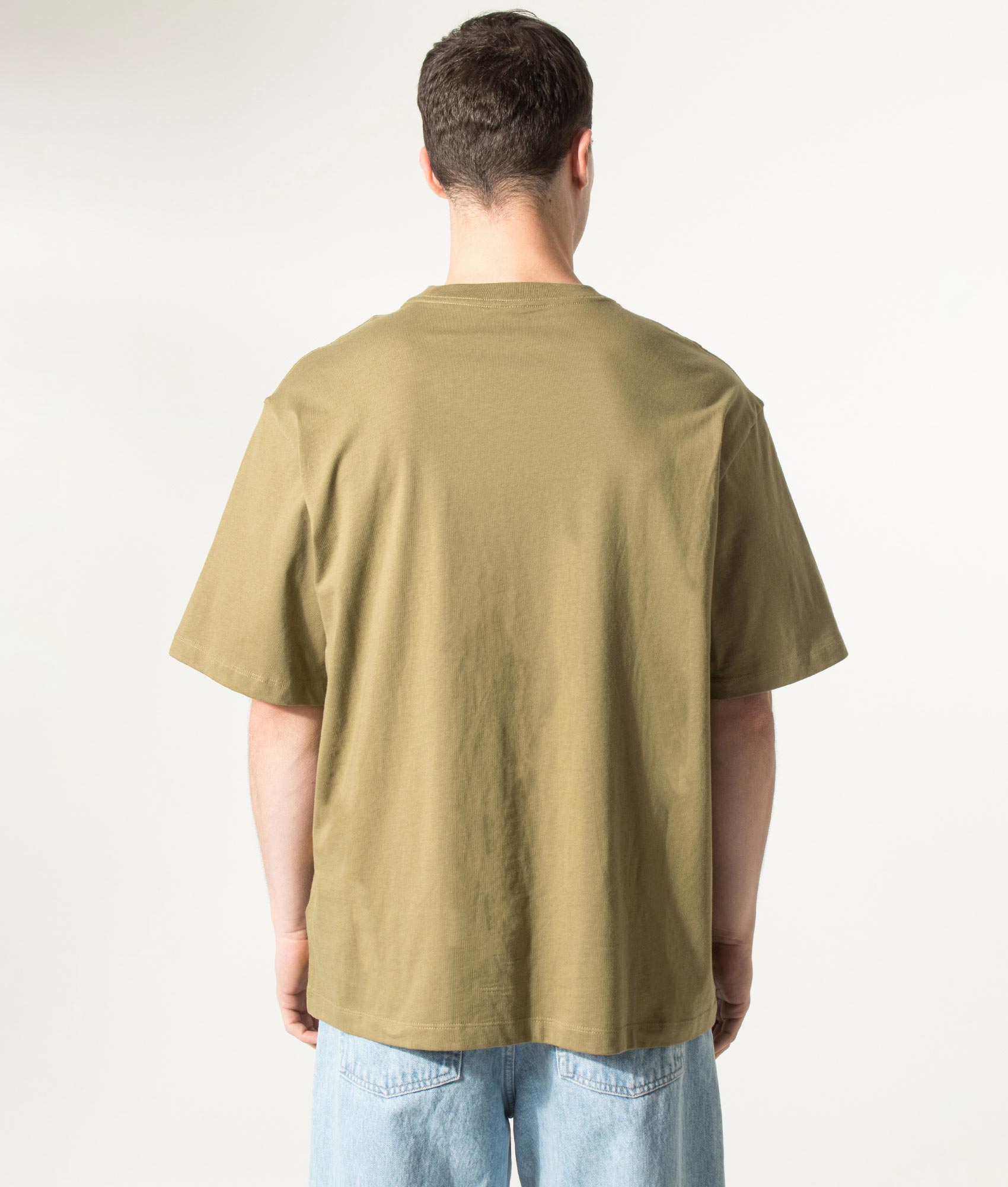 The North Face Essential Simple Dome T-Shirt in Cedar at EQVVS Menswear. Model back shot.