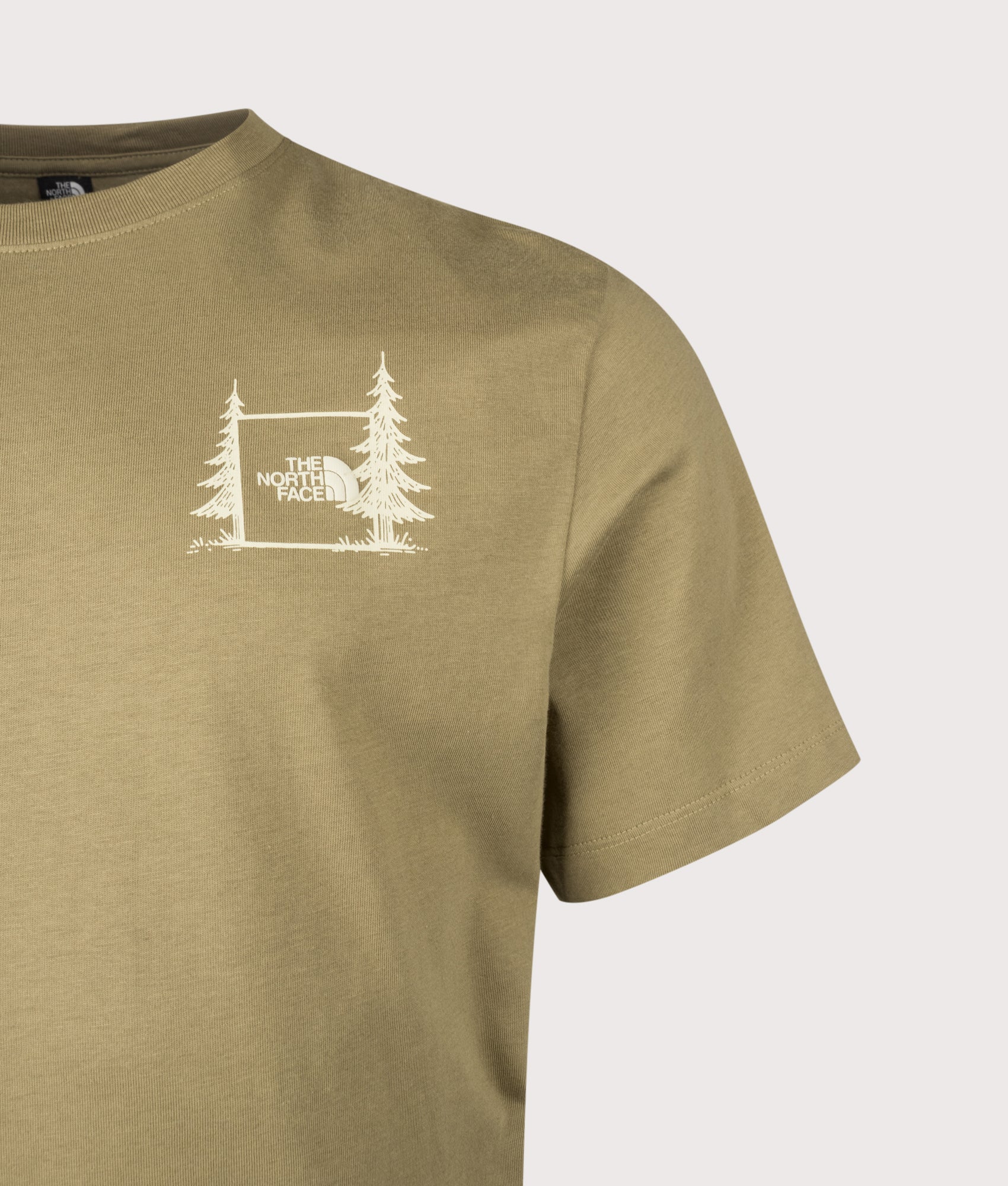The North Face Relaxed Fit Camping T-Shirt in Cedar at EQVVS Menswear. Detail shot.