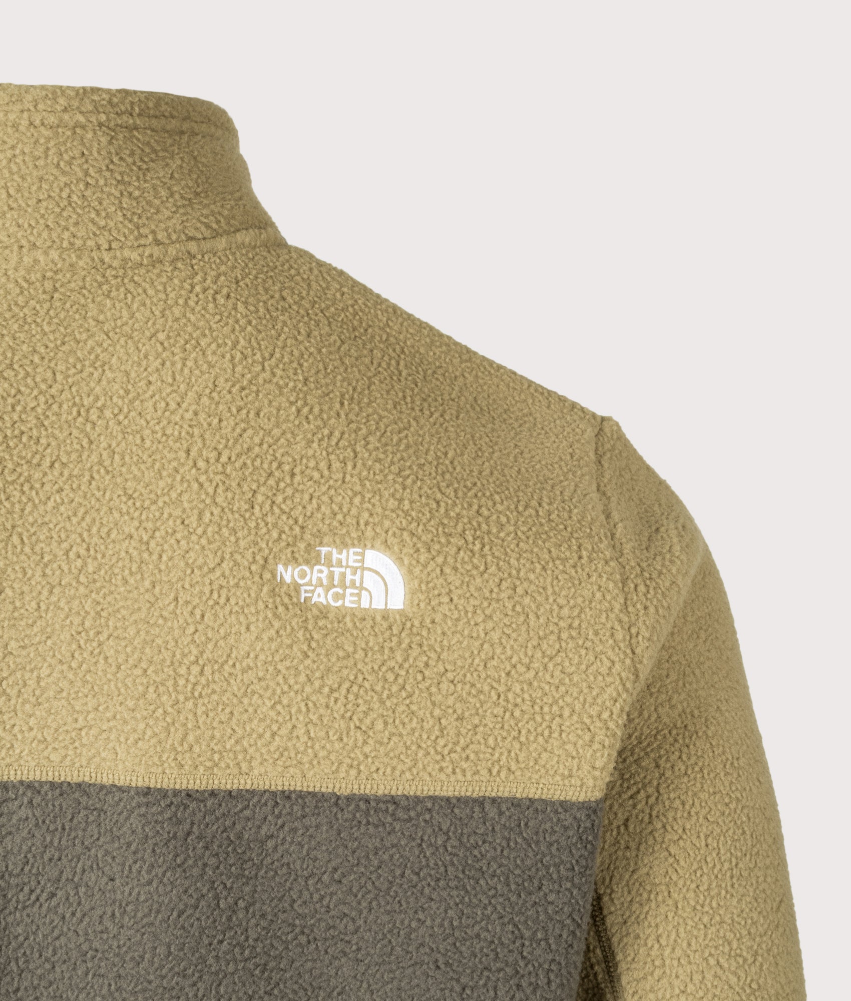 The North Face Yumiori Quarter Zip Fleece in New Taupe Green at EQVVS Menswear. Back detail shot.