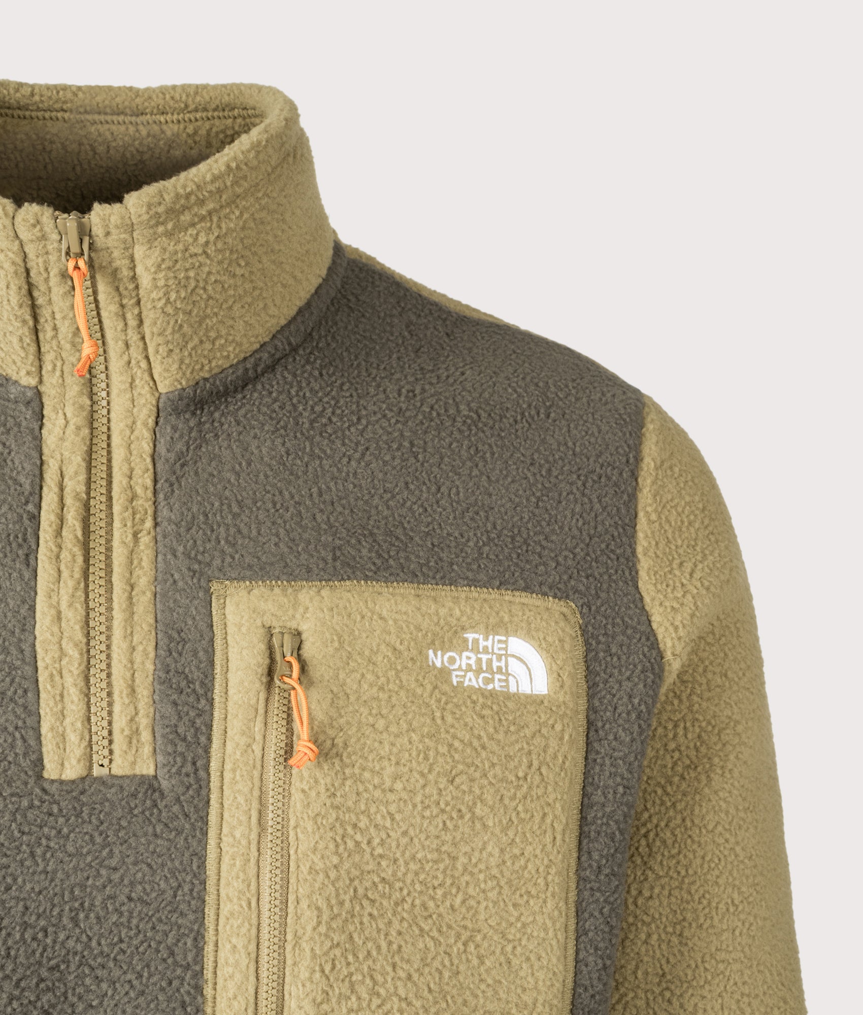 The North Face Yumiori Quarter Zip Fleece in New Taupe Green at EQVVS Menswear. Front detail shot.
