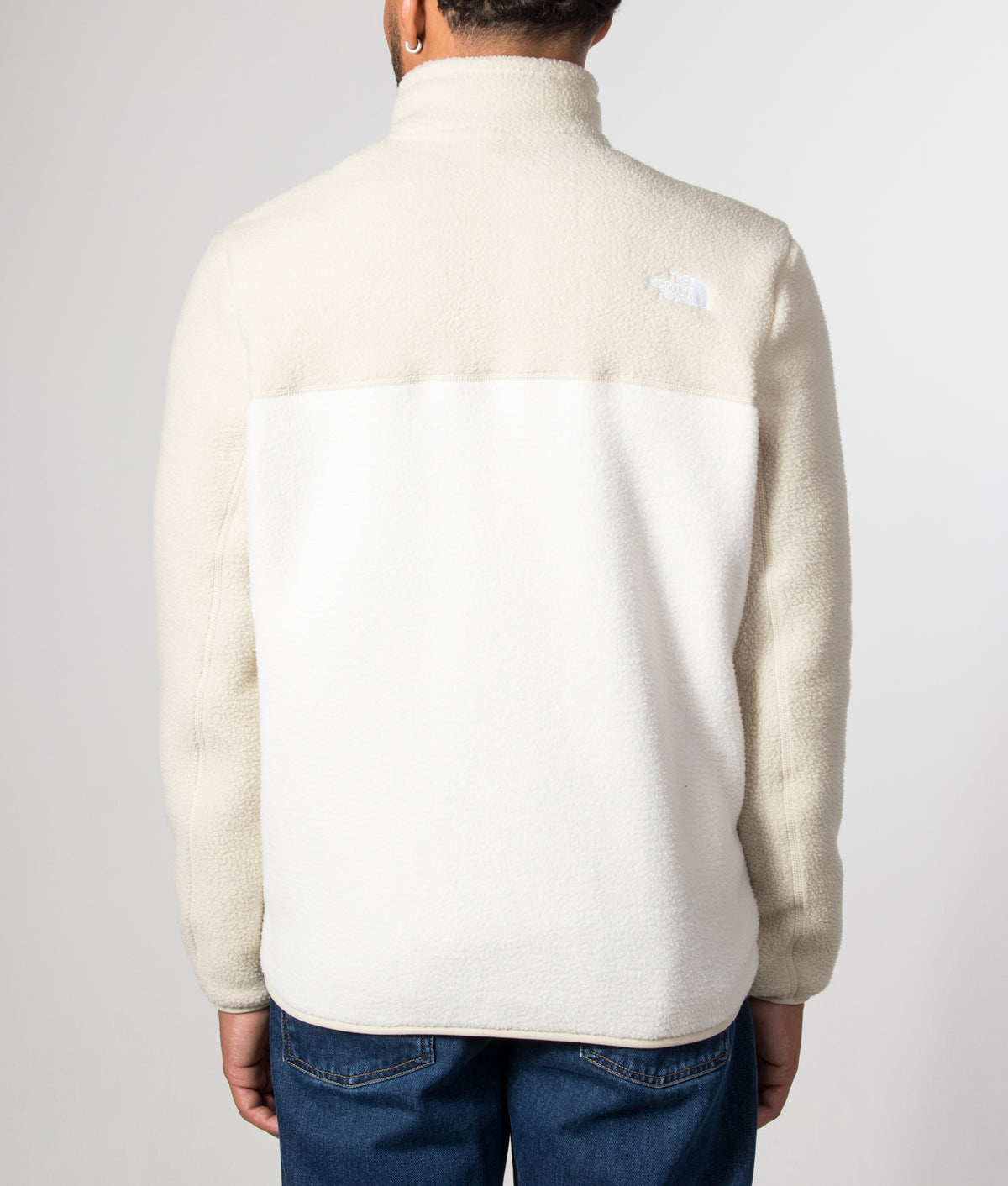 The North Face Regular Fit Yumiori Zip Through Fleece in White Dune/Desert Stone at EQVVS Menswear. Model back shot.