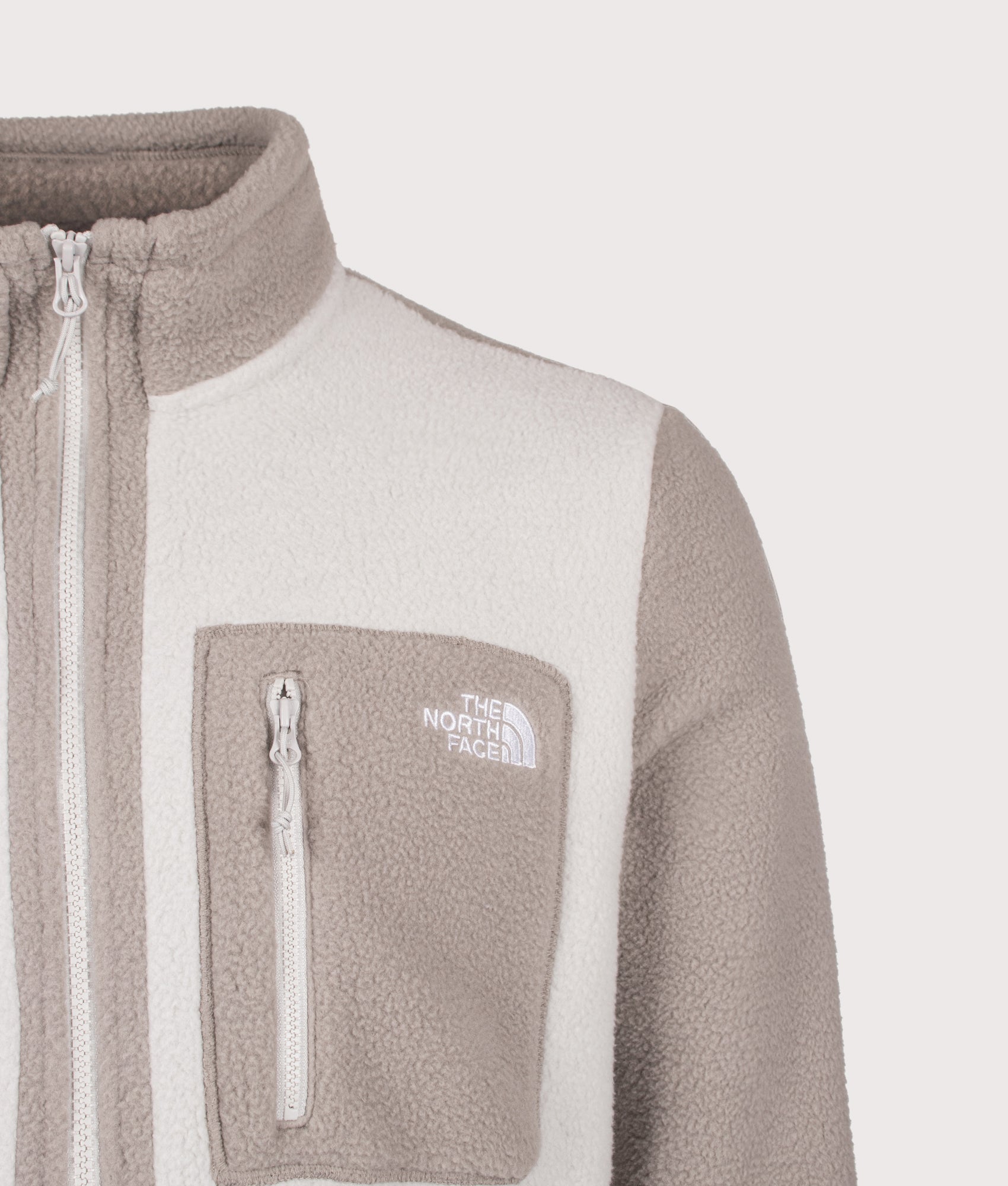 The North Face Regular Fit Yumiori Zip Through Fleece in Cumulus Cloud and Stone Slab at EQVVS Menswear. Detail shot.