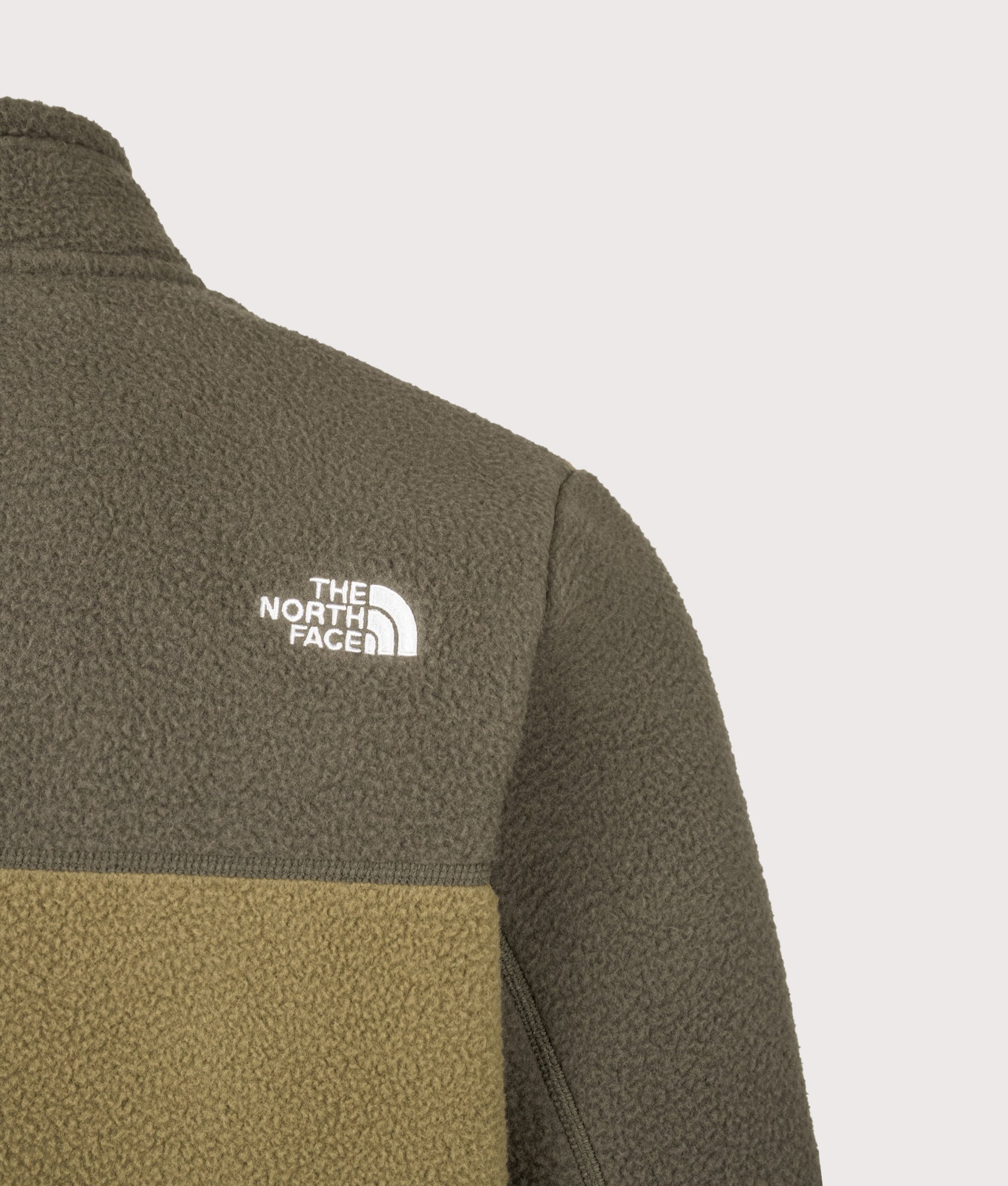 The North Face Regular Fit Yumiori Zip Through Fleece in Caraway Seed and New Taupe Green at EQVVS Menswear. Back detail shot.