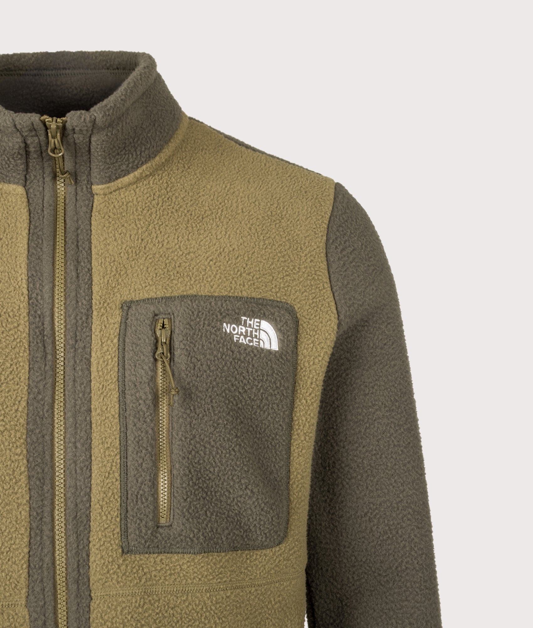 The North Face Regular Fit Yumiori Zip Through Fleece in Caraway Seed and New Taupe Green at EQVVS Menswear. Detail shot.
