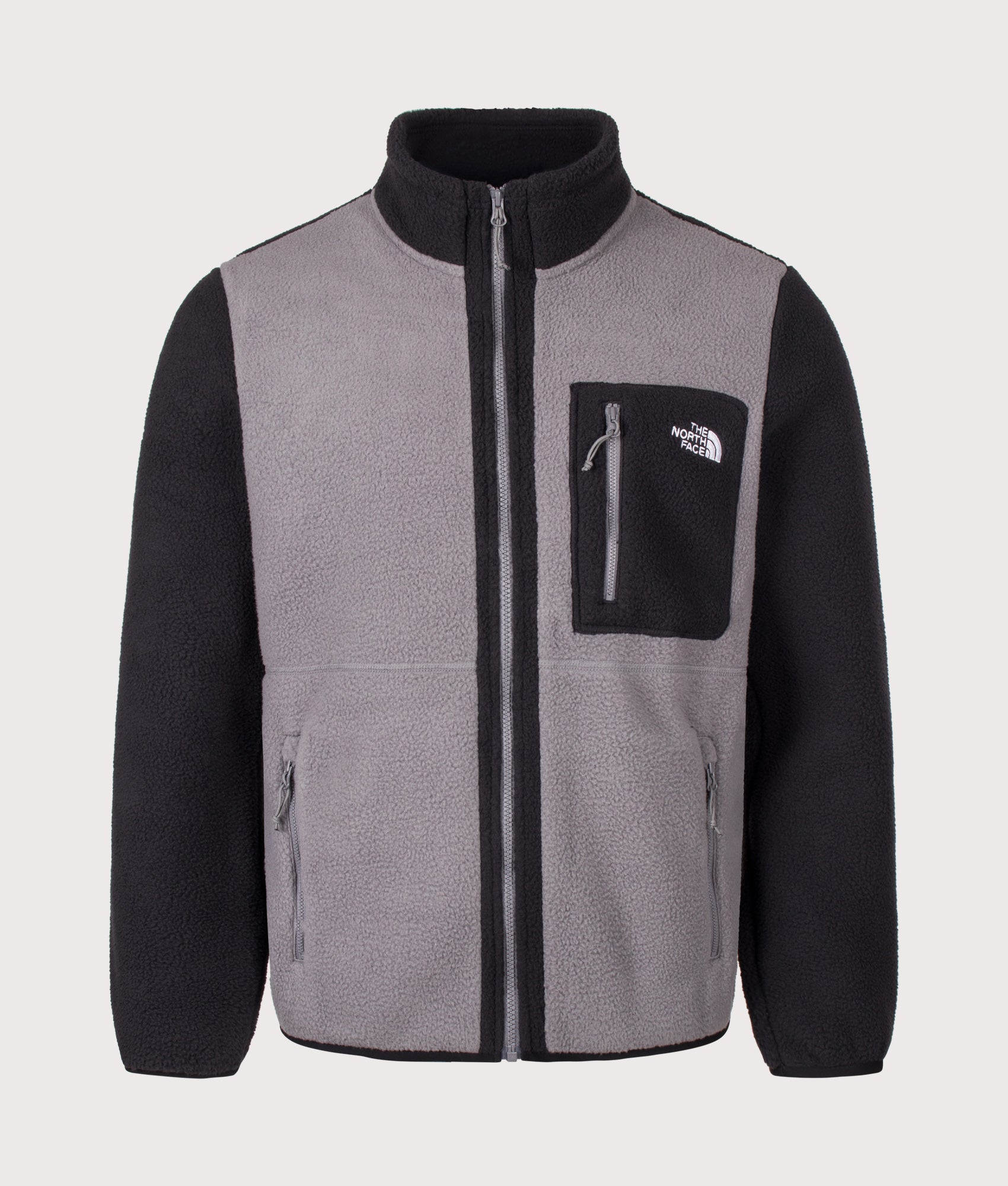 The North Face Regular Fit Yumiori Zip Through Fleece in  Smoked Pearl and TNF Black at EQVVS Menswear. Front shot.