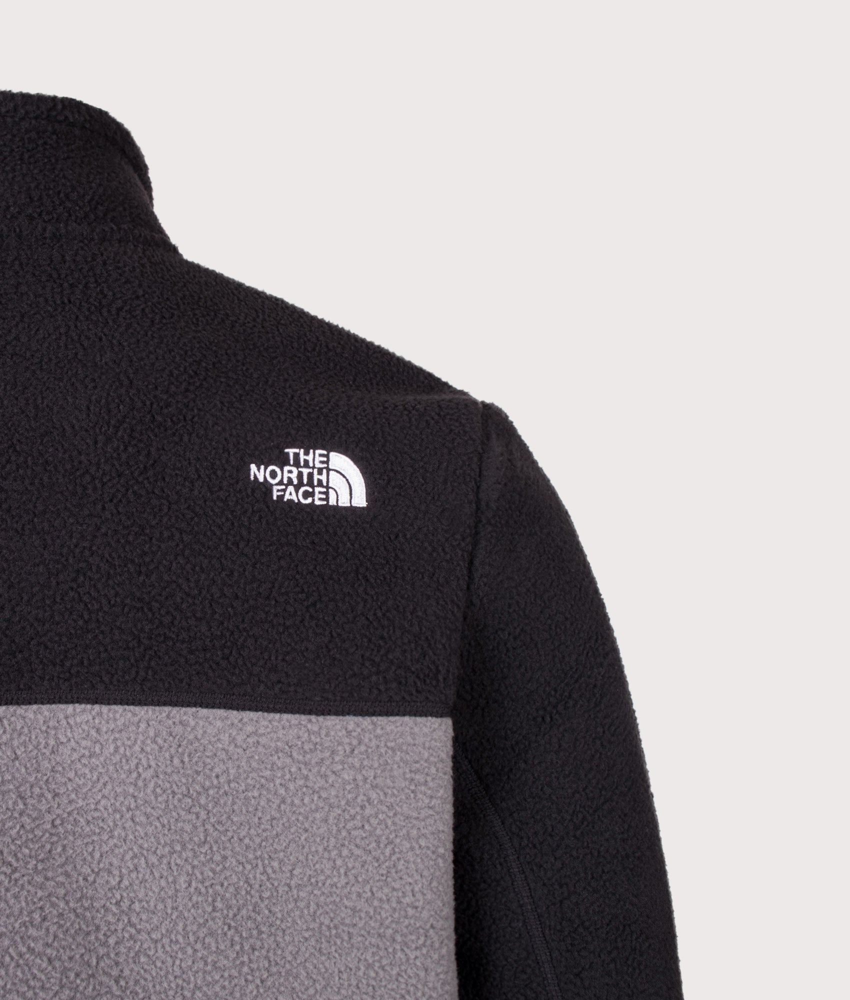 The North Face Regular Fit Yumiori Zip Through Fleece in  Smoked Pearl and TNF Black at EQVVS Menswear. Back detail shot.