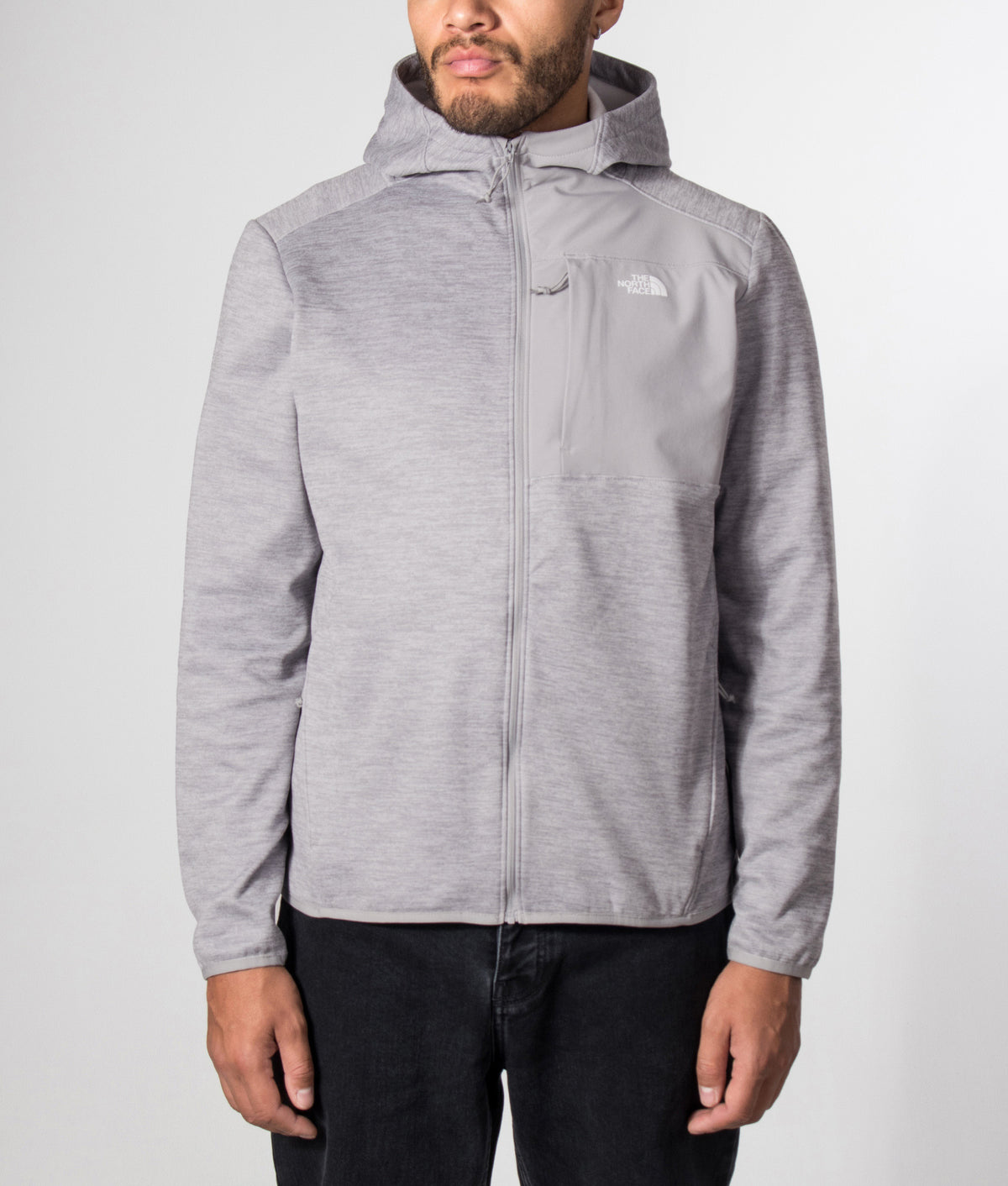 The North Face Regular Fit Performance Zip Through Fleece Hoodie in TNF Pale Grey Heather at EQVVS Menswear. Model front shot.