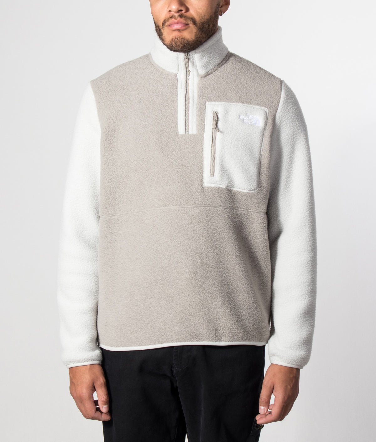 The North Face Regular Fit Yumiori Quarter Zip Fleece in Stone Slab and Cumulus Cloud at EQVVS Menswear. Model front shot.