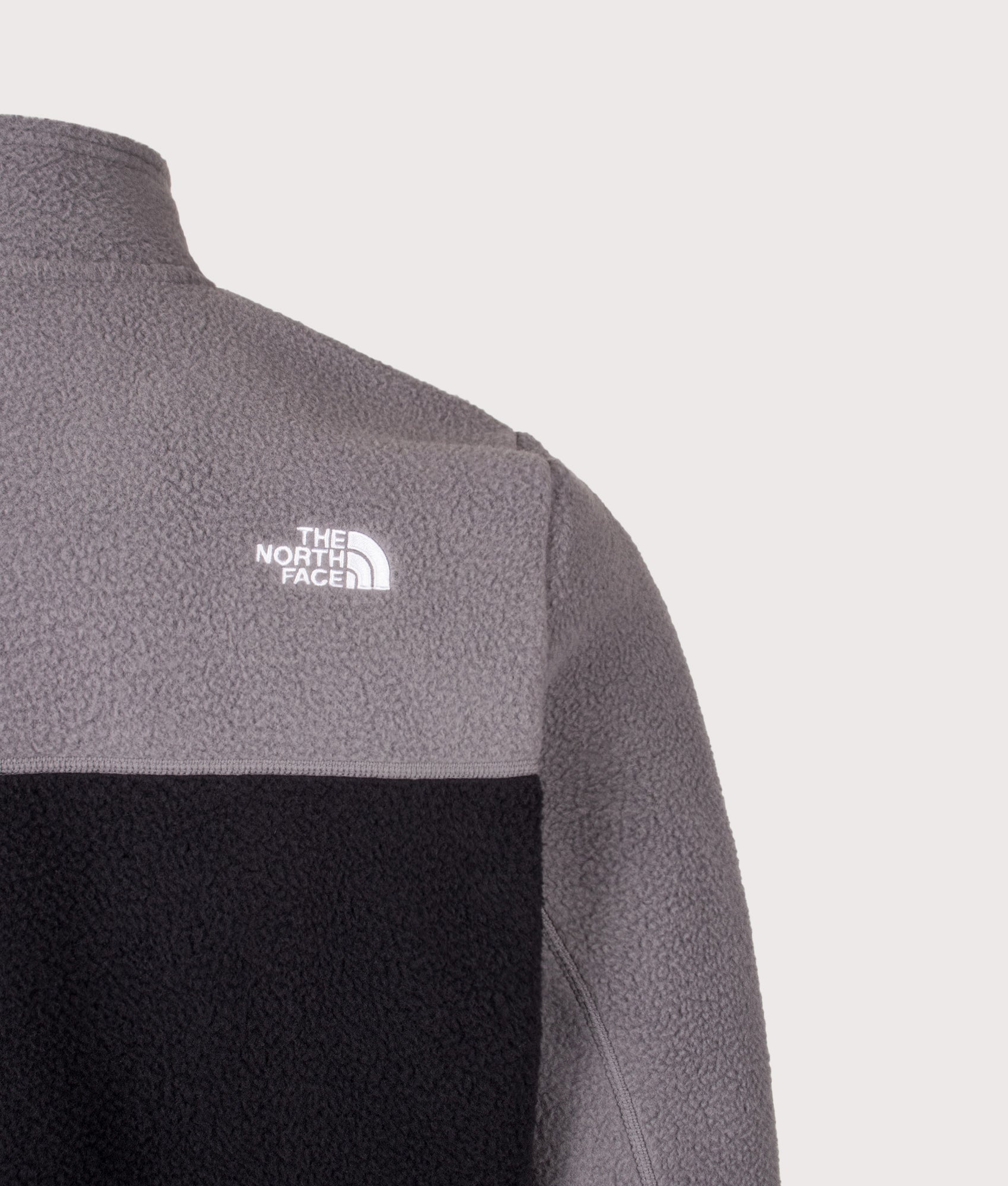 The North Face Regular Fit Yumiori Quarter Zip Fleece in Smoked Pearl and TNF Black at EQVVS Menswear. Back detail shot.