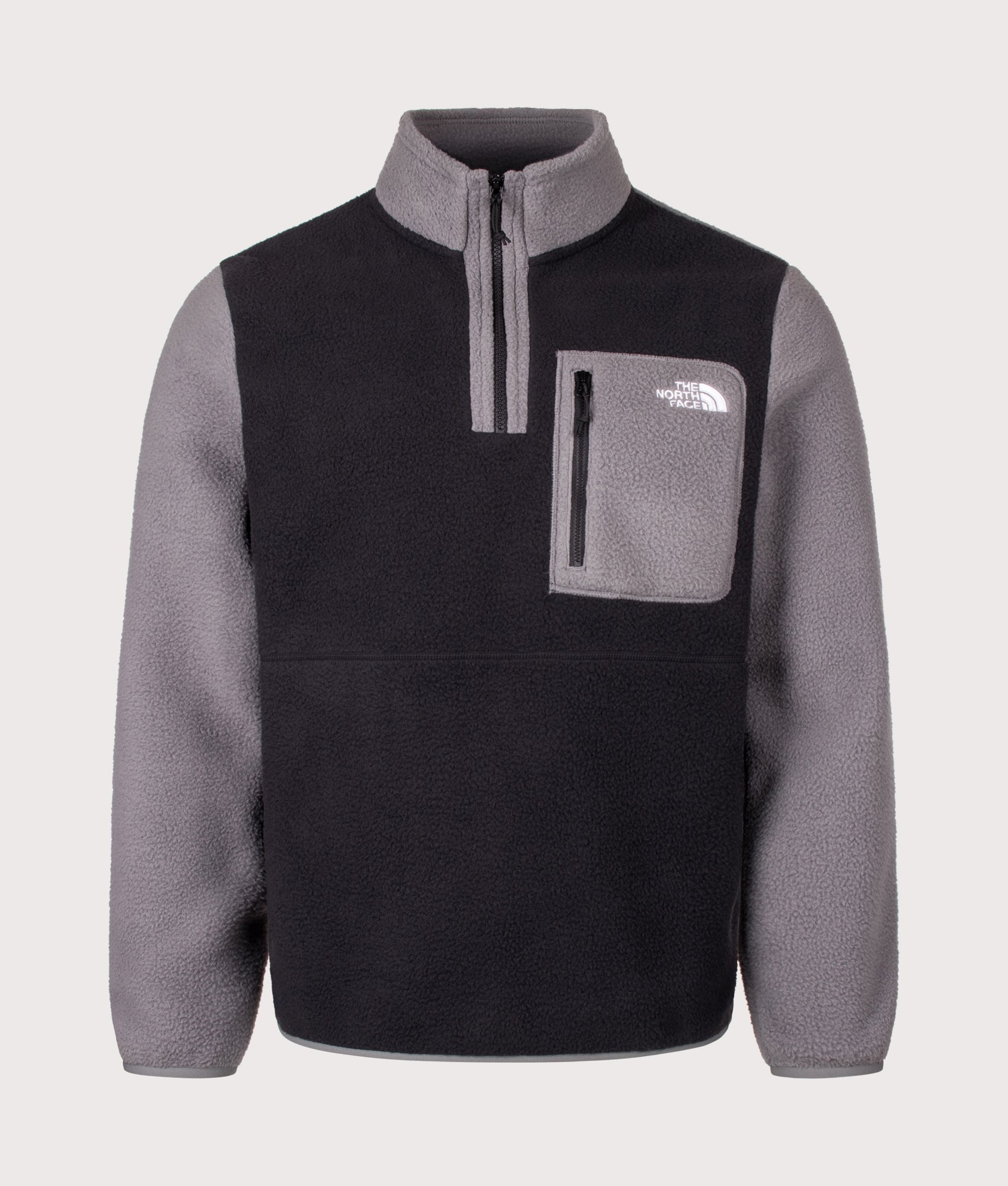 The North Face Regular Fit Yumiori Quarter Zip Fleece in Smoked Pearl and TNF Black at EQVVS Menswear. Front shot.