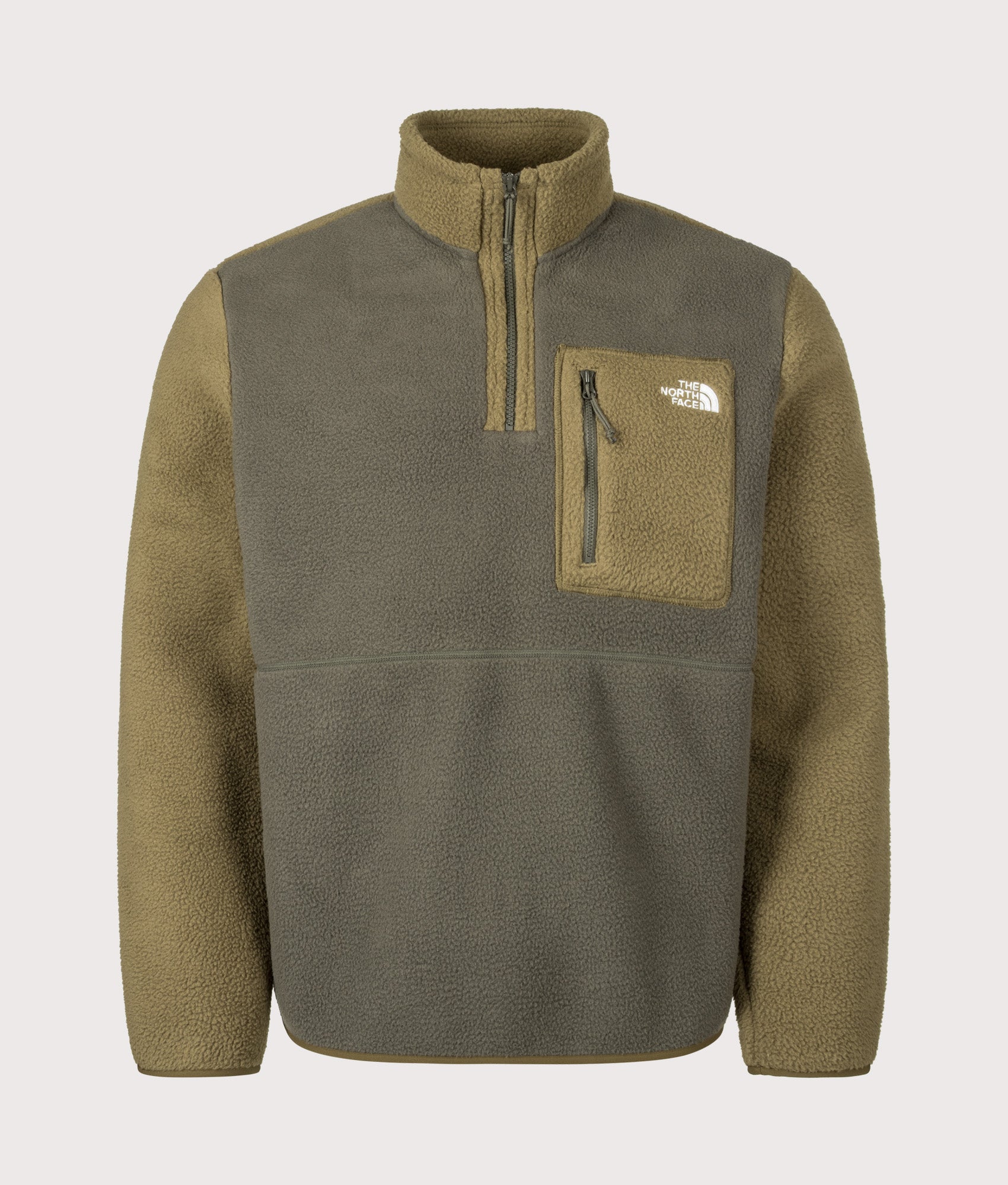 The North Face Regular Fit Yumiori Quarter Zip Fleece in New Taupe Green at EQVVS Menswear. Front shot.