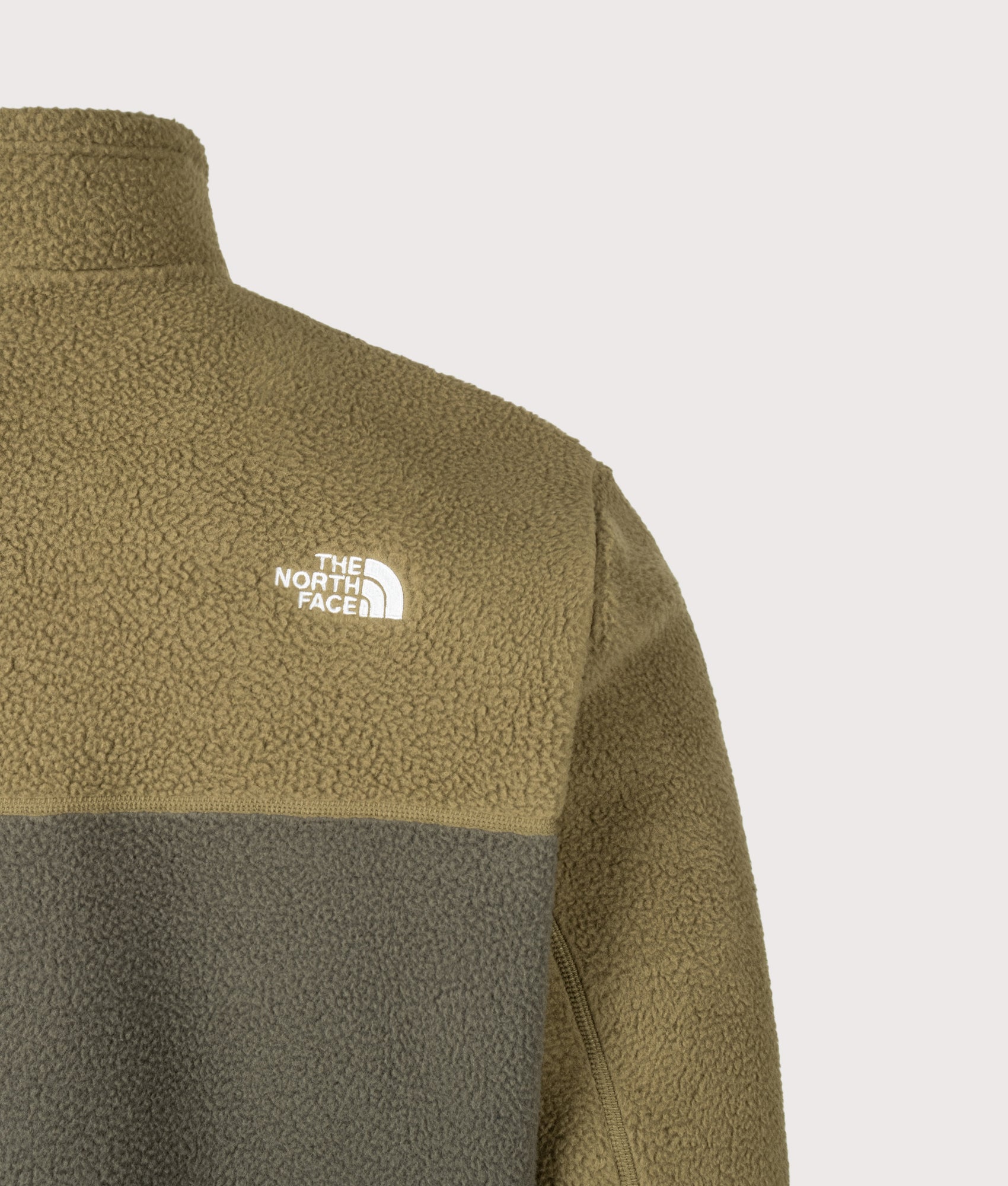 The North Face Regular Fit Yumiori Quarter Zip Fleece in New Taupe Green at EQVVS Menswear. Back detail shot.