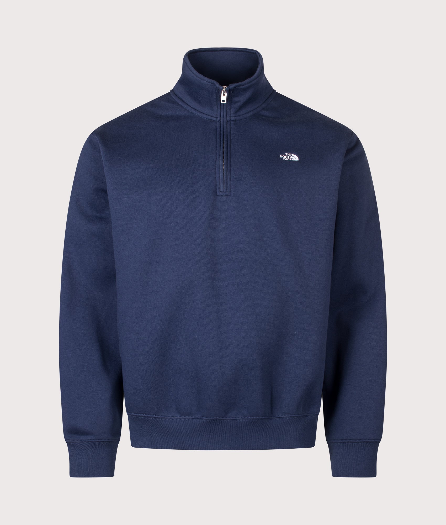 The North Face Relaxed Fit Essential Simple Dome Quarter Zip Hoodie in Summit Navy at EQVVS Menswear. Front shot.