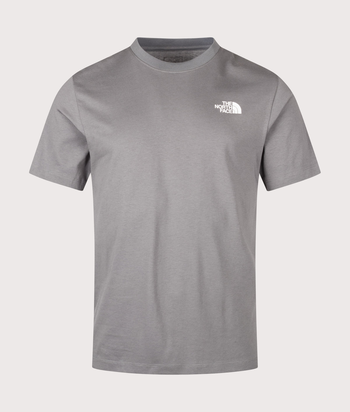 The North Face Regular Fit NSE Box Celebration T-Shirt in Smoked Pearl at EQVVS Menswear. Front shot.