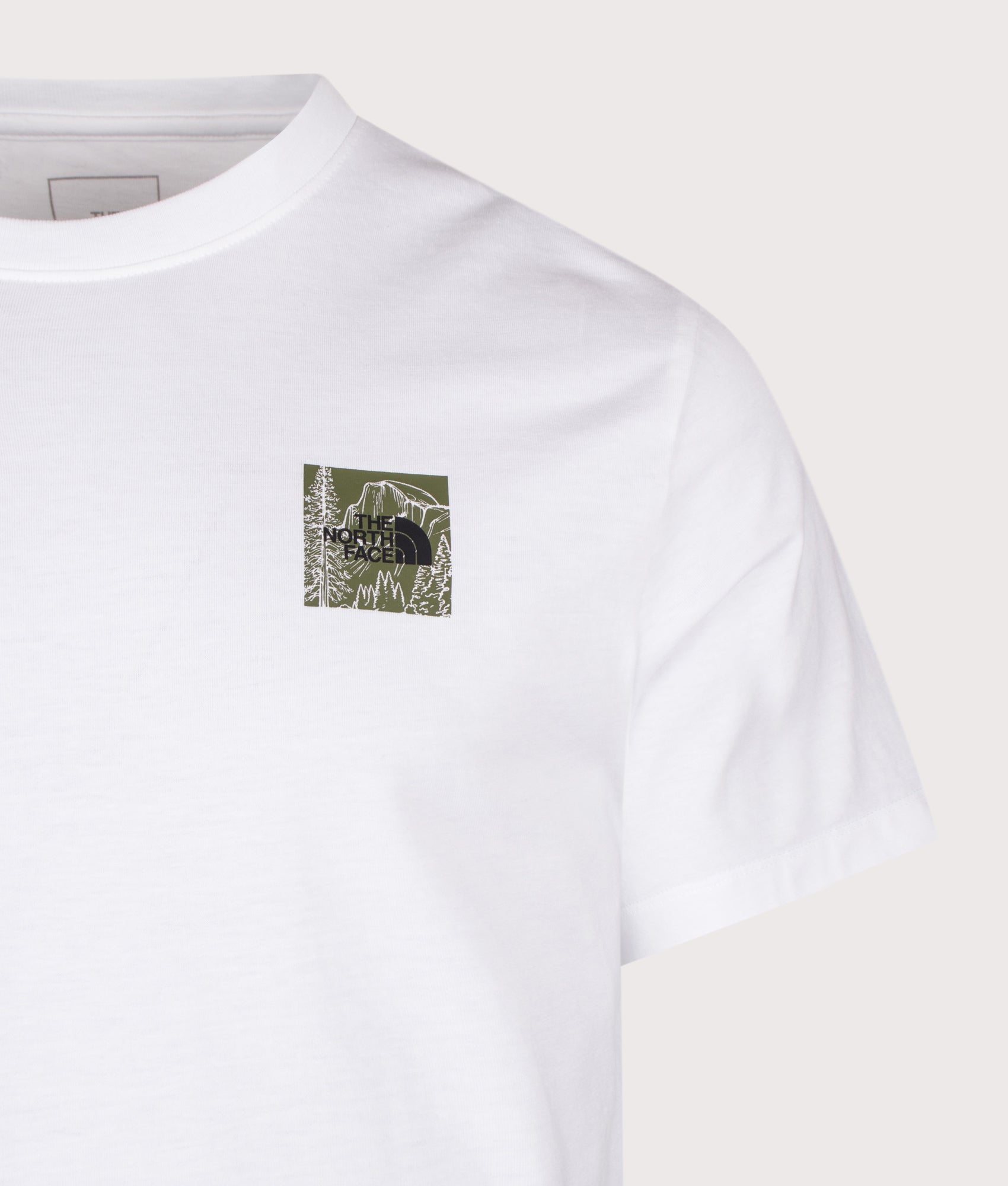 The North Face Regular Fit Monte Graphic T-Shirt in TNF White at EQVVS Menswear. Detail shot. 