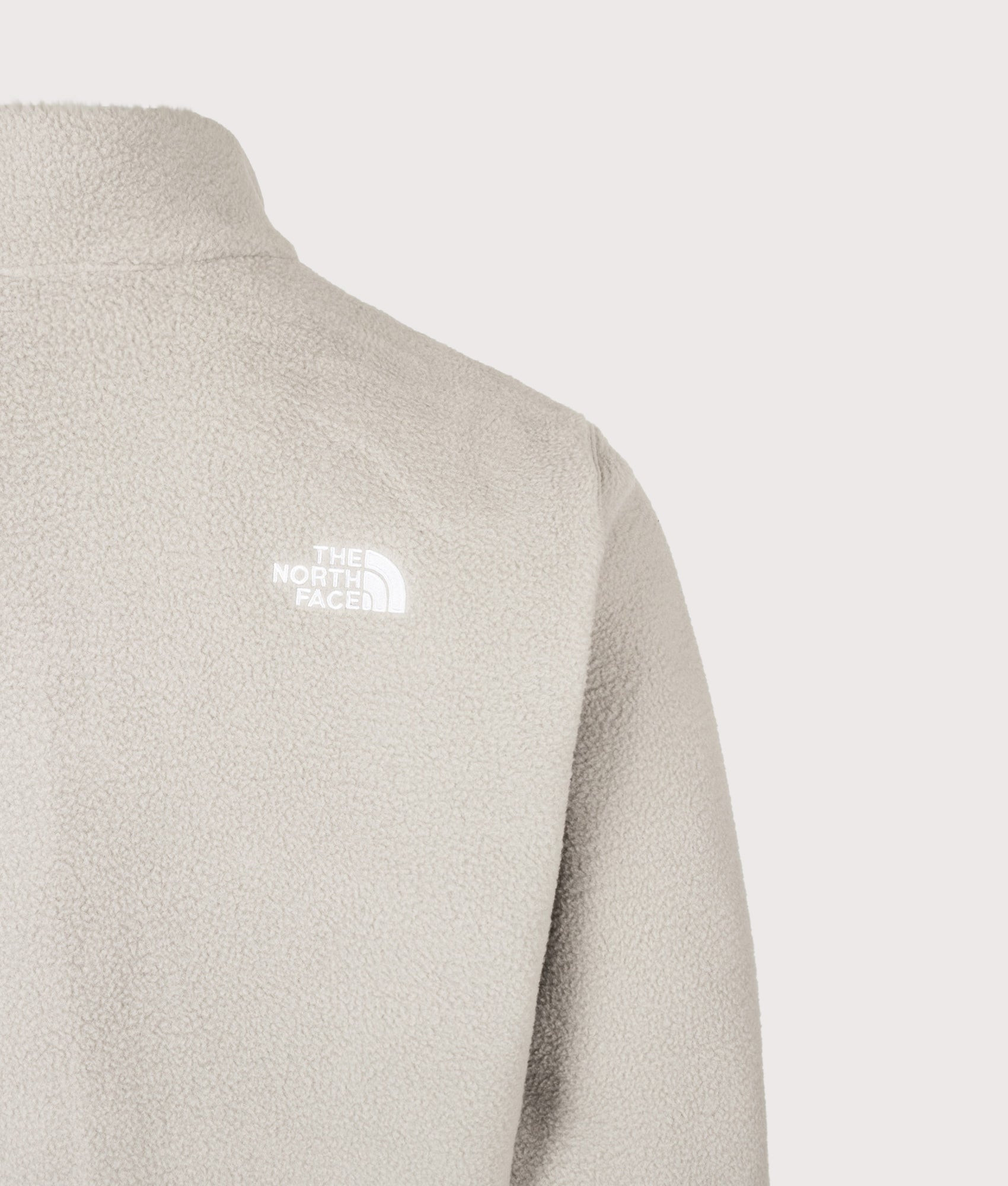 The North Face Relaxed Fit TNF Fleeski Zip Through Fleece in Stone Slab at EQVVS Menswear. Back shot.