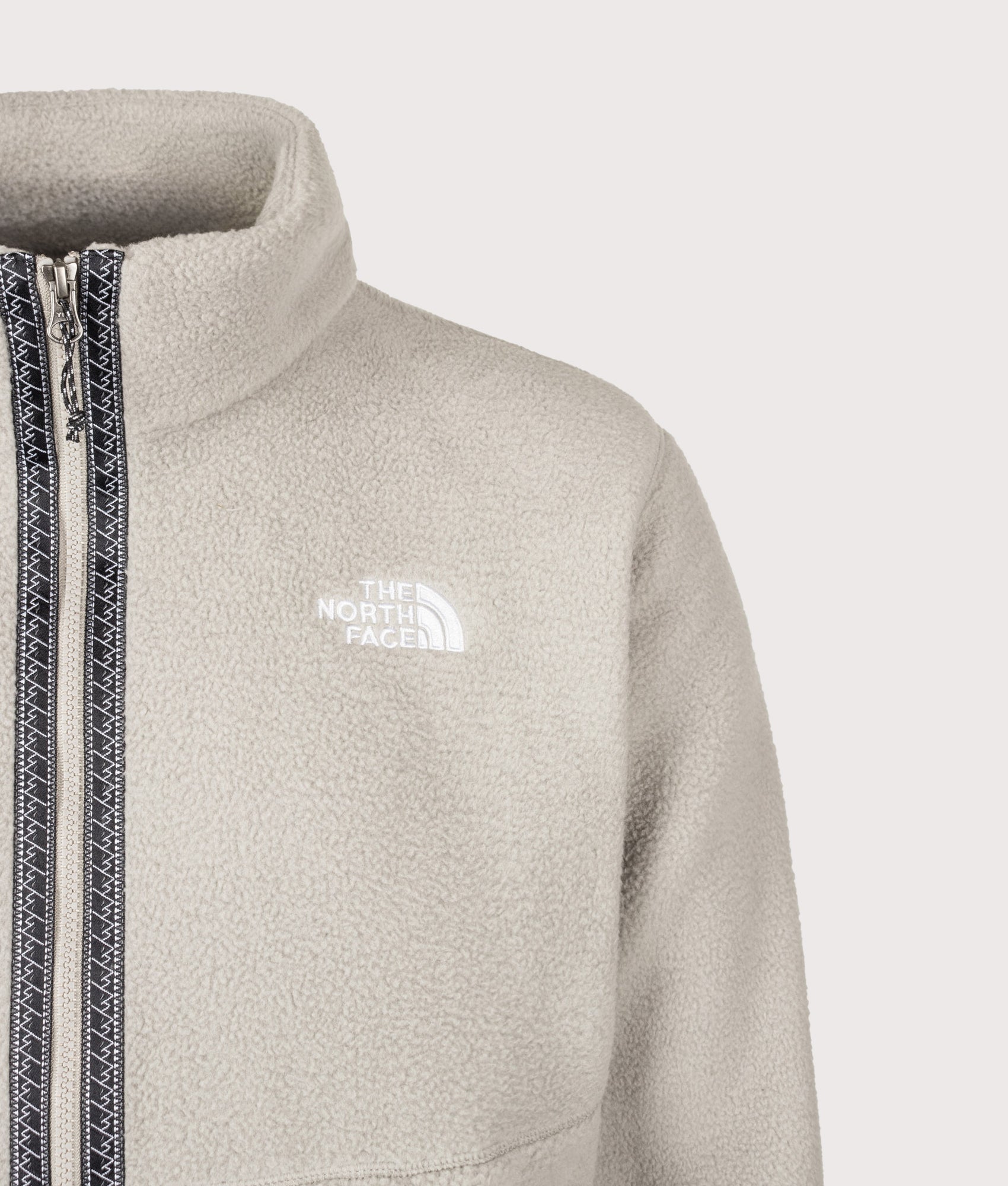 The North Face Relaxed Fit TNF Fleeski Zip Through Fleece in Stone Slab at EQVVS Menswear. Detail shot.