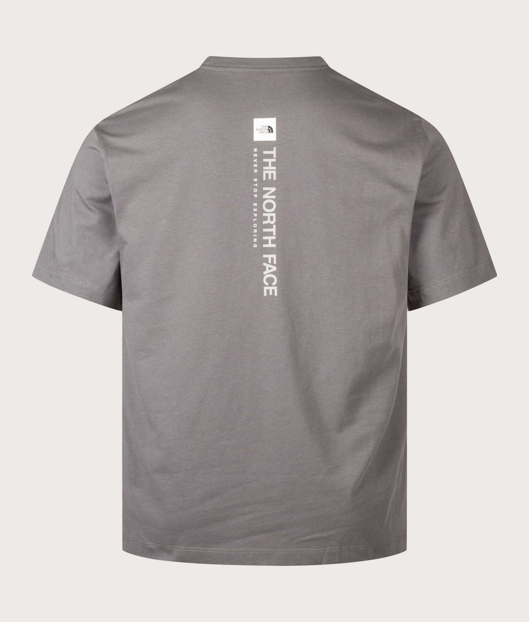 The North Face Regular Fit Vertical Graphic T-Shirt in Smoked Pearl at EQVVS Menswear. Back shot.
