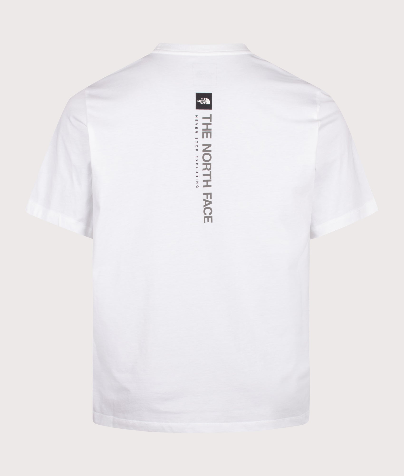 The North Face Regular Fit Vertical Graphic T-Shirt in TNF White at EQVVS Menswear. Back shot.