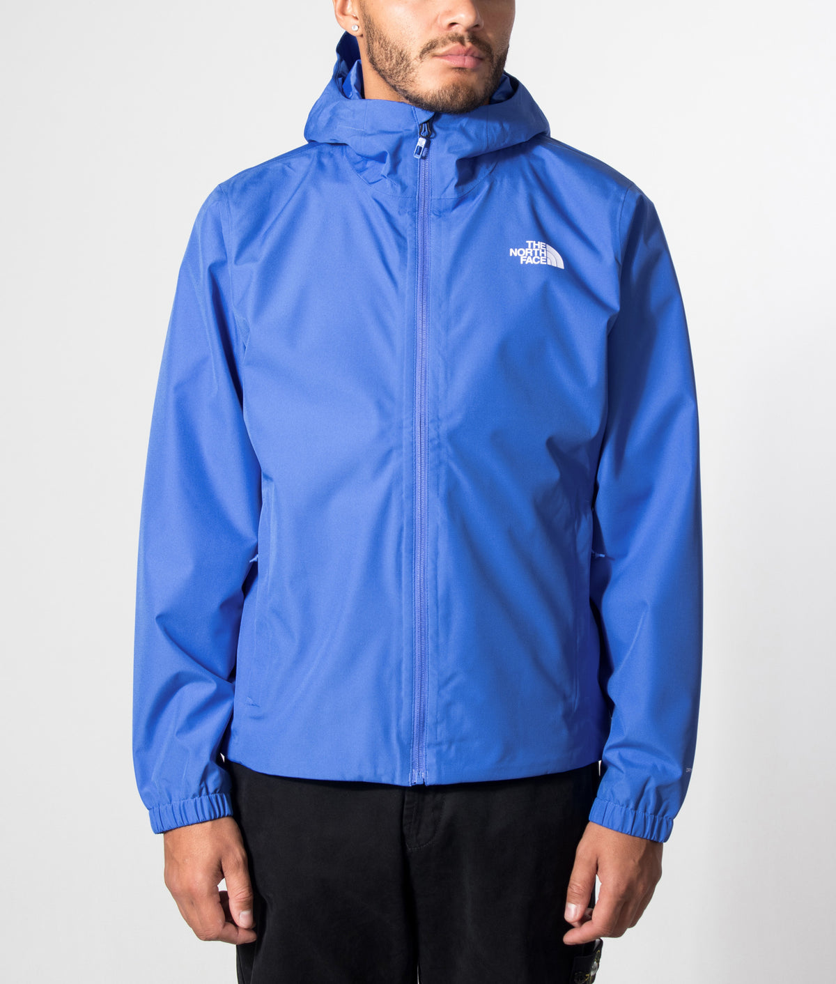 The North Face Regular Fit Quest DryVent™ Jacket in Active Blue at EQVVS Menswear. Model front shot.