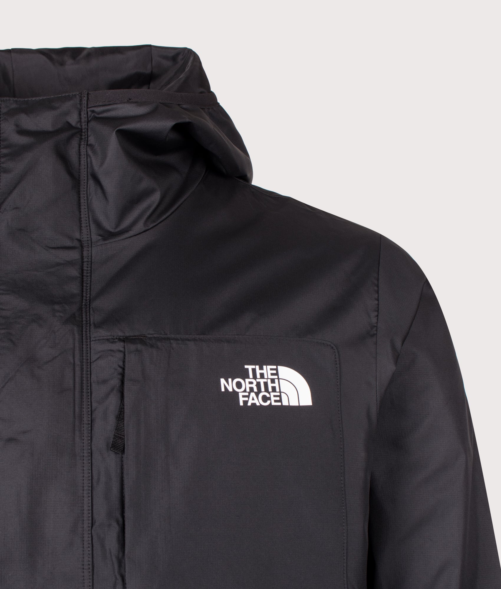 The North Face Regular Fit Nuketo Windbreaker in TNF Black at EQVVS Menswear. Detail shot.