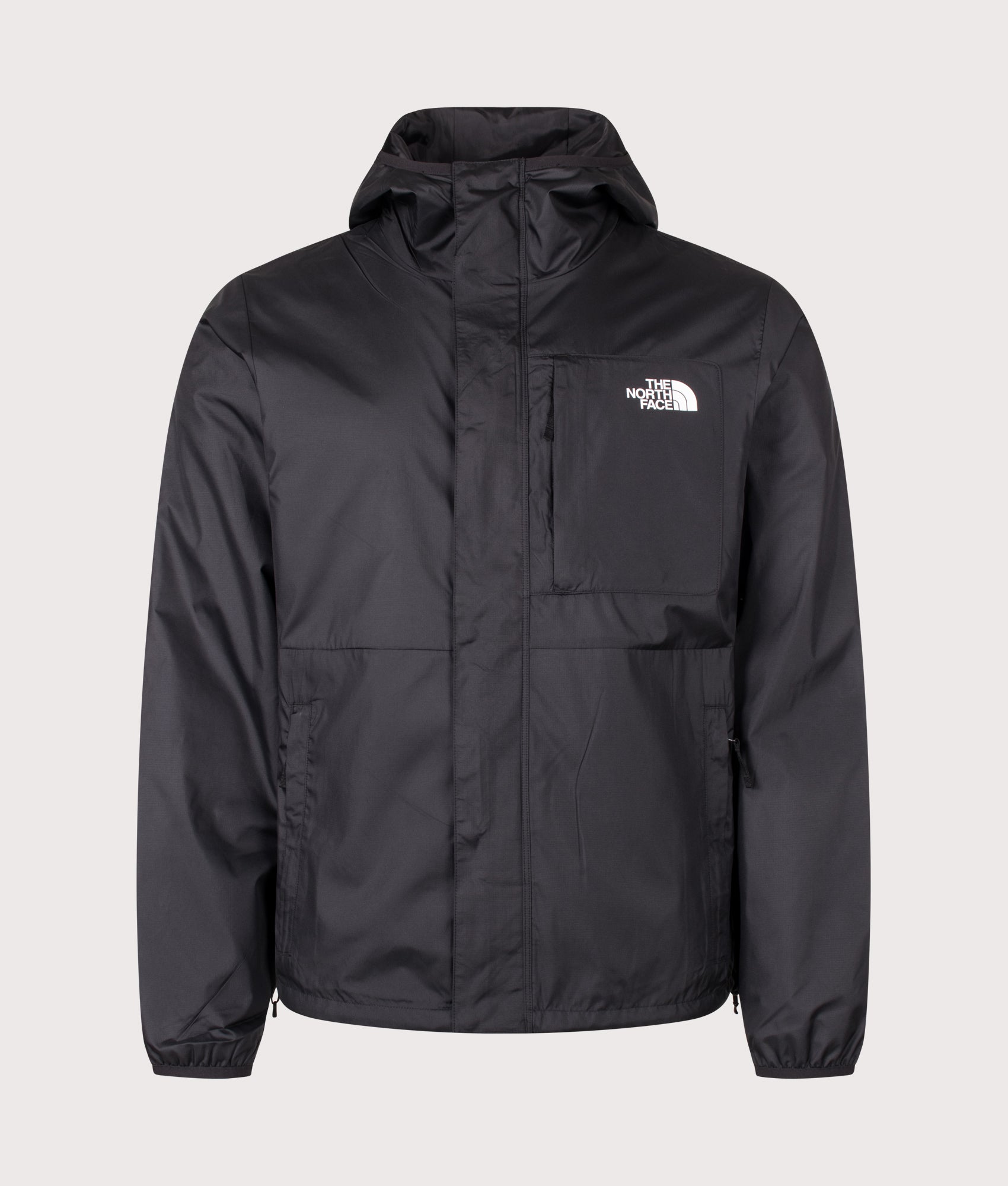 The North Face Regular Fit Nuketo Windbreaker in TNF Black at EQVVS Menswear. Front shot.