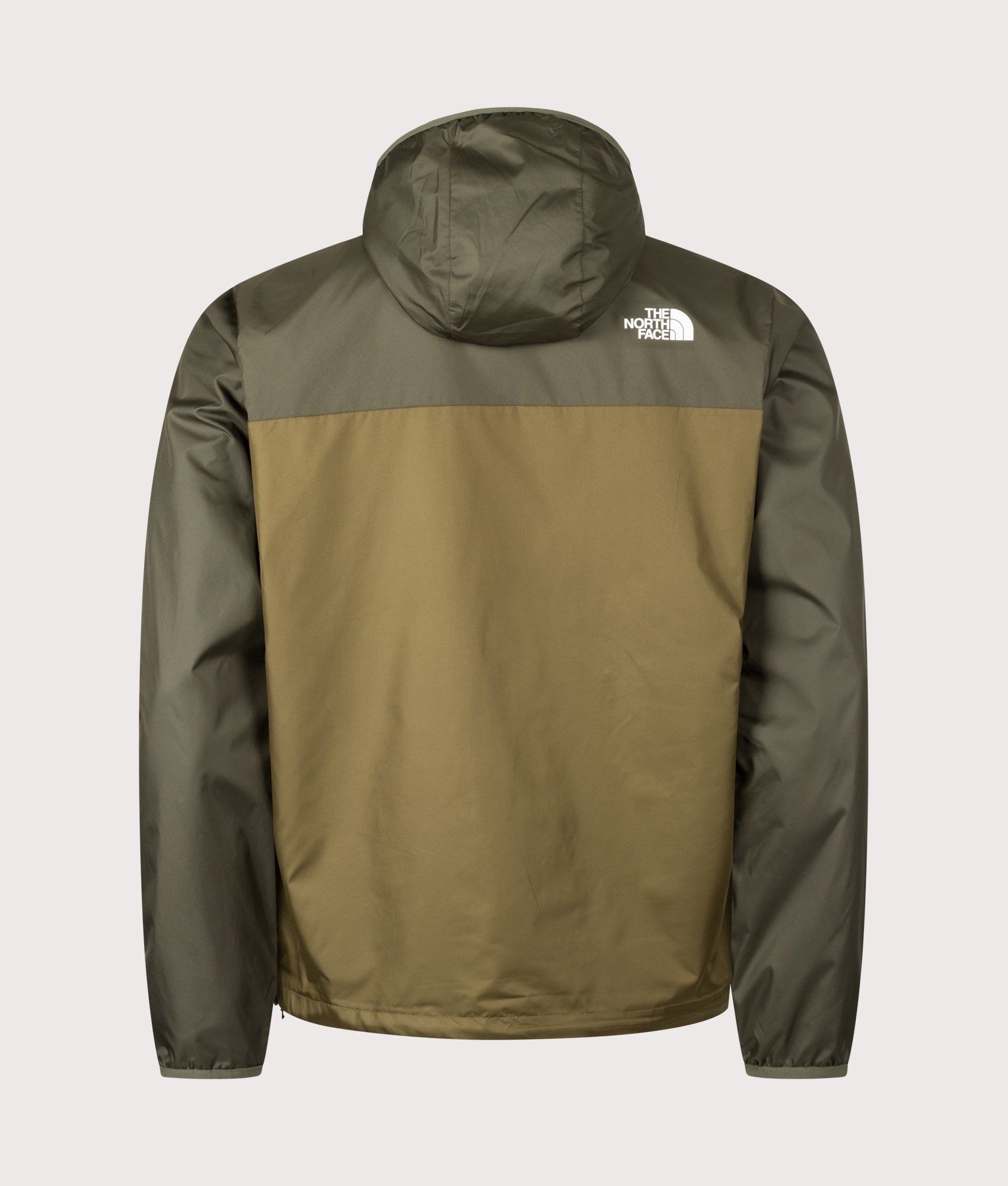 The North Face Regular Fit Nuketo Windbreaker in Caraway Seed and New Taupe Green at EQVVS Menswear. Back shot.