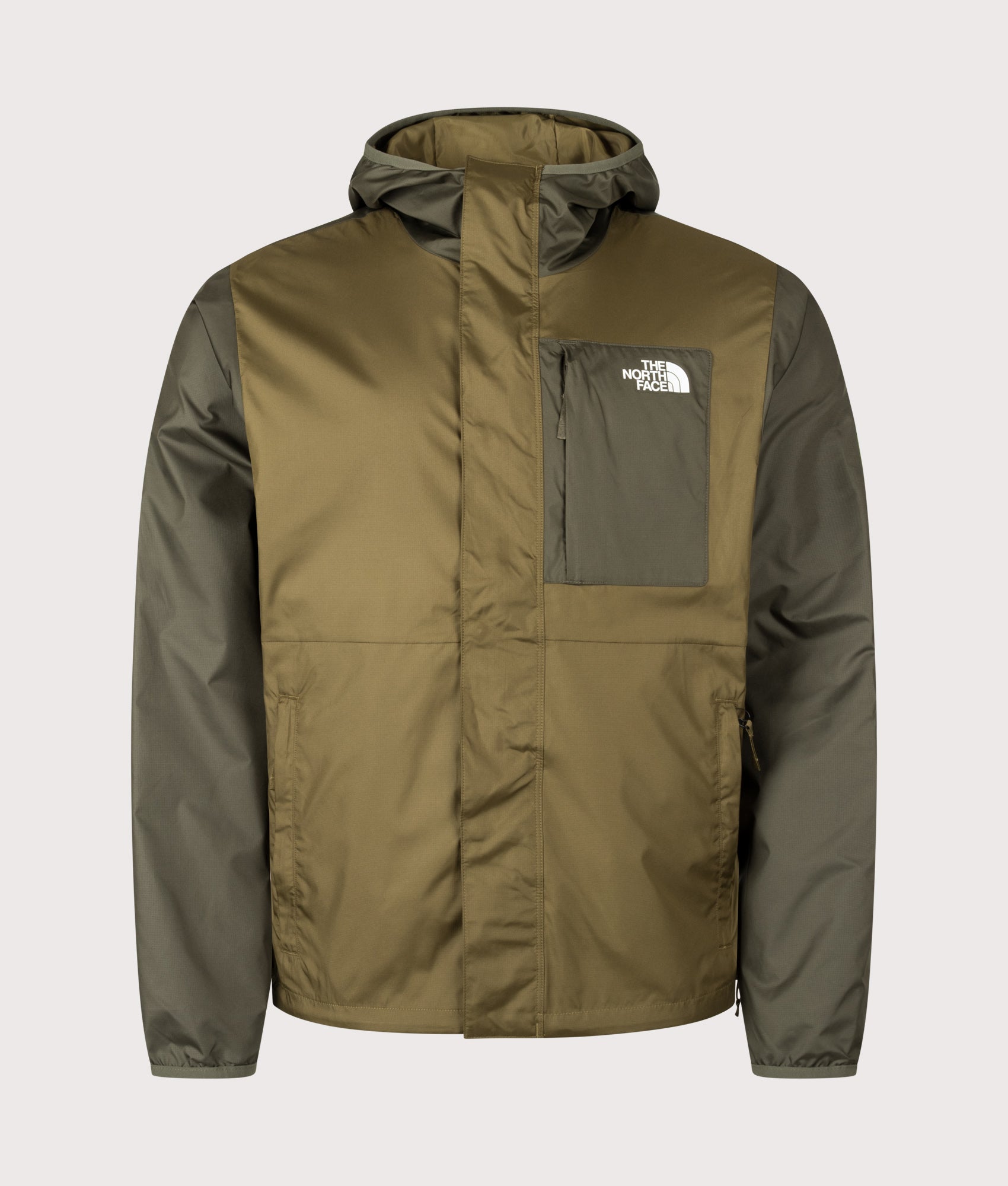 The North Face Regular Fit Nuketo Windbreaker in Caraway Seed and New Taupe Green at EQVVS Menswear. Front shot.