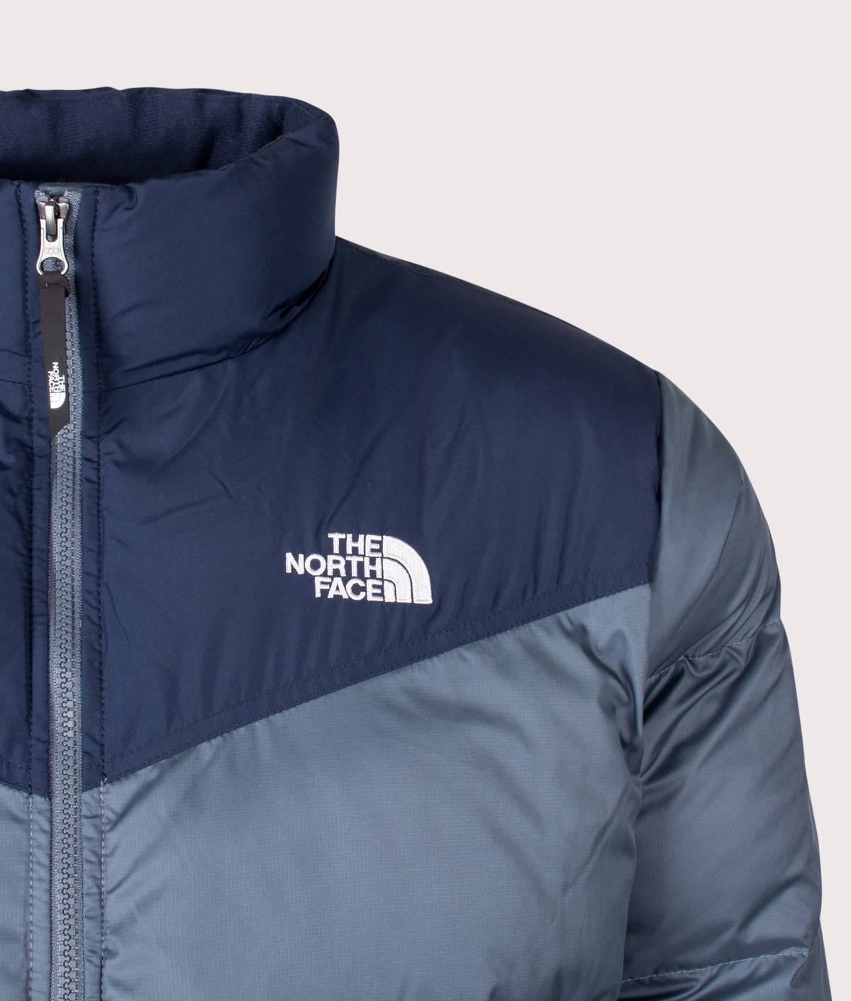 The North Face Regular Fit Saikuru Jacket in Granite Grey and Summit Navy at EQVVS Menswear. Detail shot.