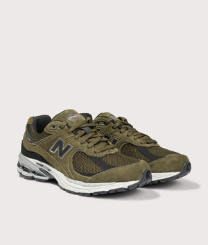 2002R Sneakers by New Balance in U2002RR Woodland. Shot by EQVVS. Front detail shot.
