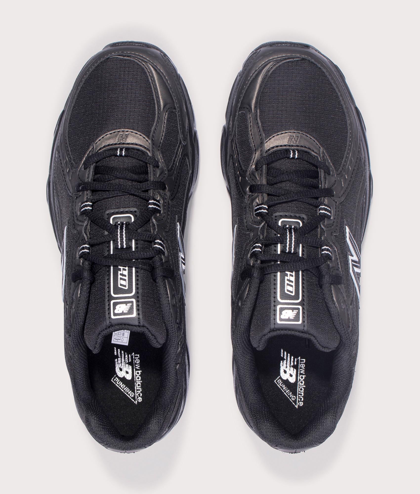 New Balance 740 in Black at EQVVS Menswear. Above shot. 