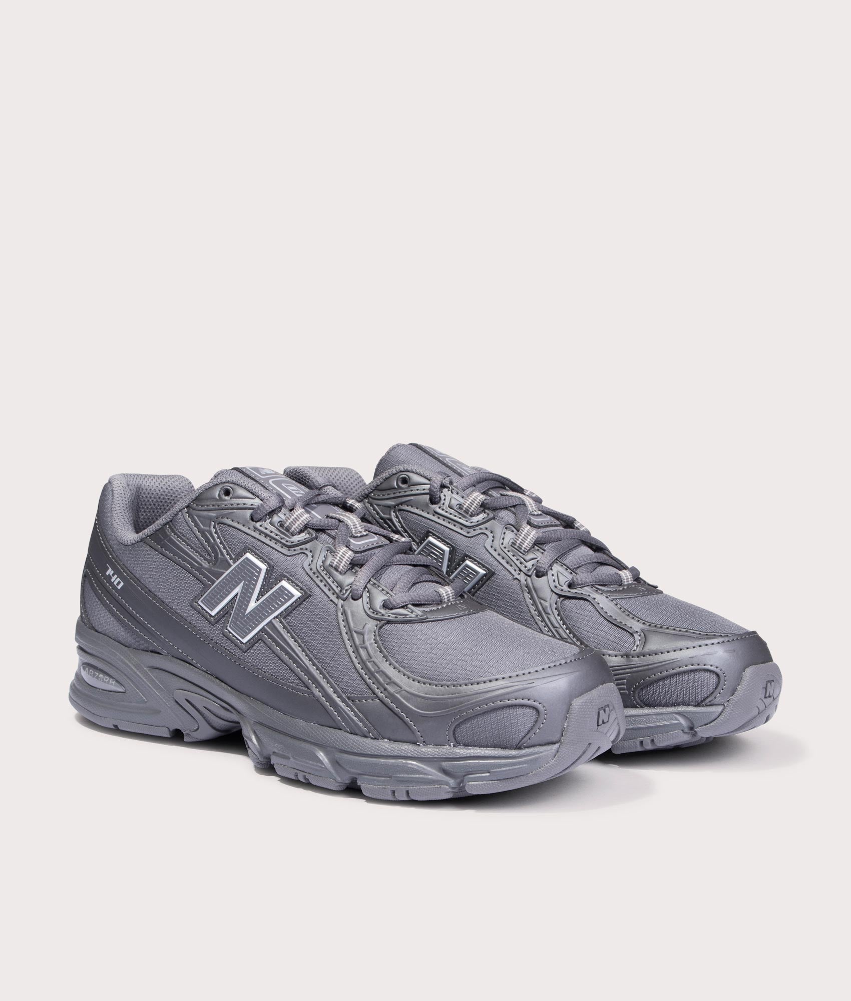 New Balance 740 Sneakers in Castlerock at EQVVS Menswear. Angled front shot.
