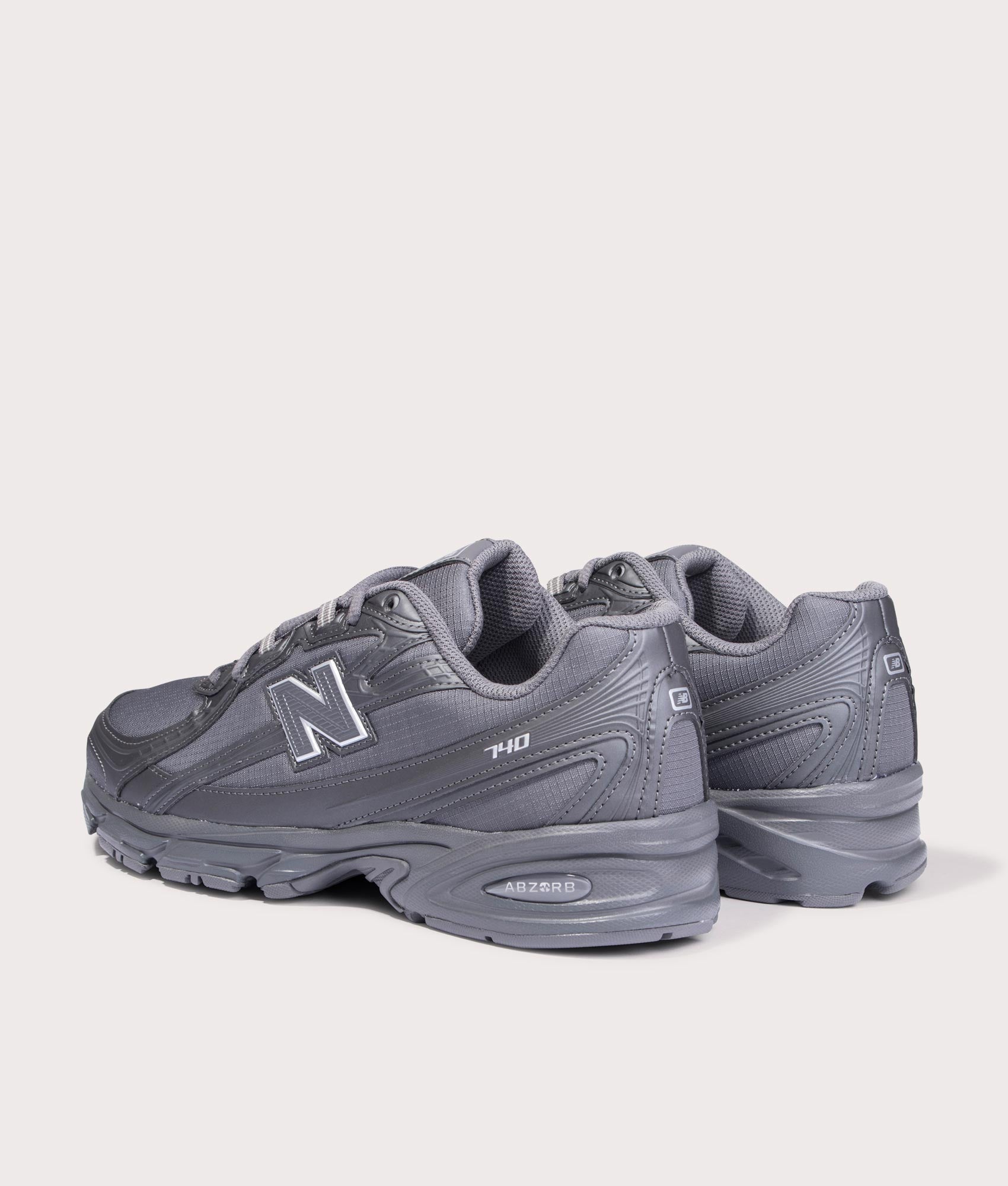New Balance 740 Sneakers in Castlerock at EQVVS Menswear. Angled Back shot.