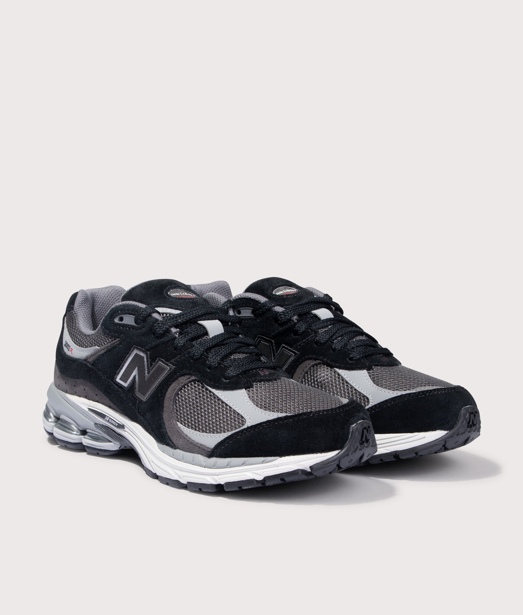 2002R Sneakers. Shot by EQVVS. Front angled shot.