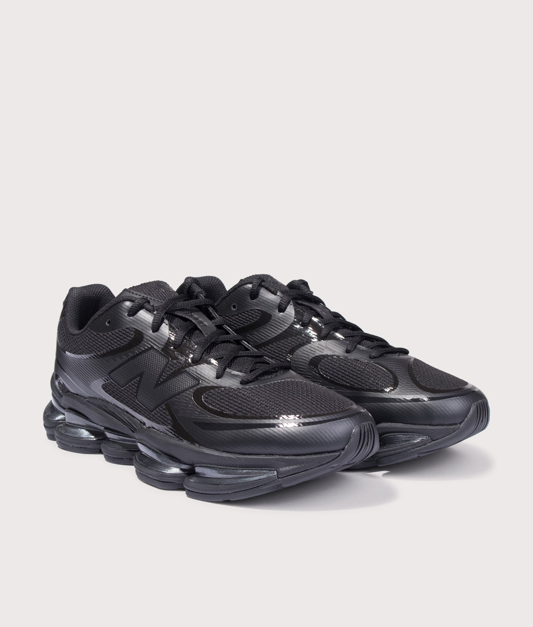 New Balance ABZORB 2000 in Black at EQVVS Menswear. Angled front shot.