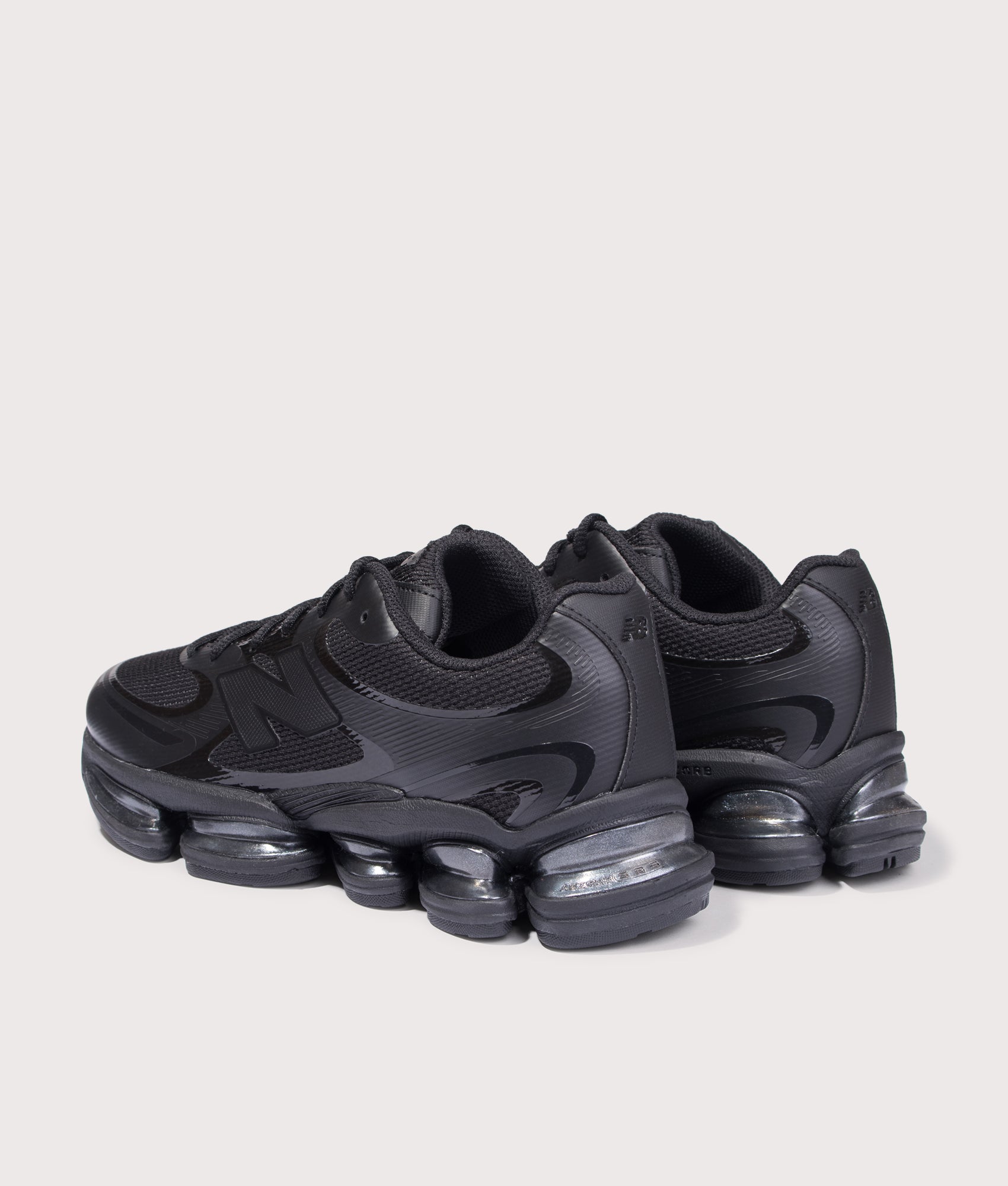 New Balance ABZORB 2000 in Black at EQVVS Menswear. Angled back shot.