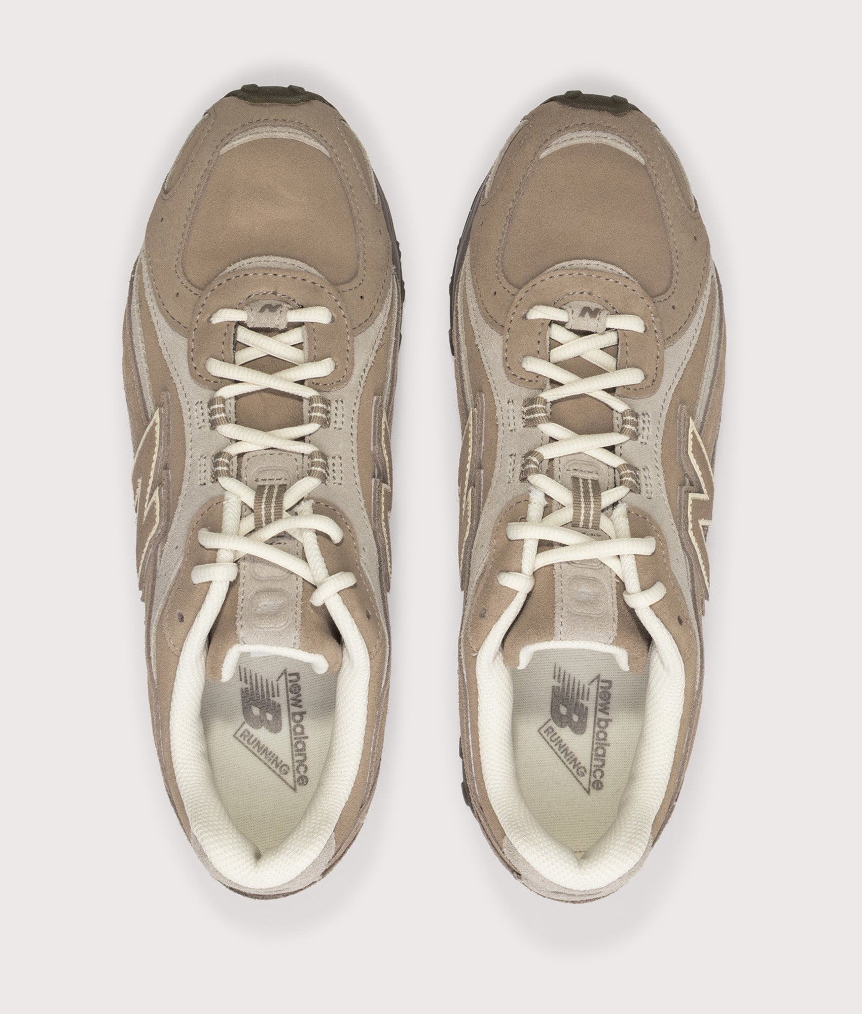 New Balance 204L Sneakers in Mushroom/Arid Stone at EQVVS Menswear. Top shot.