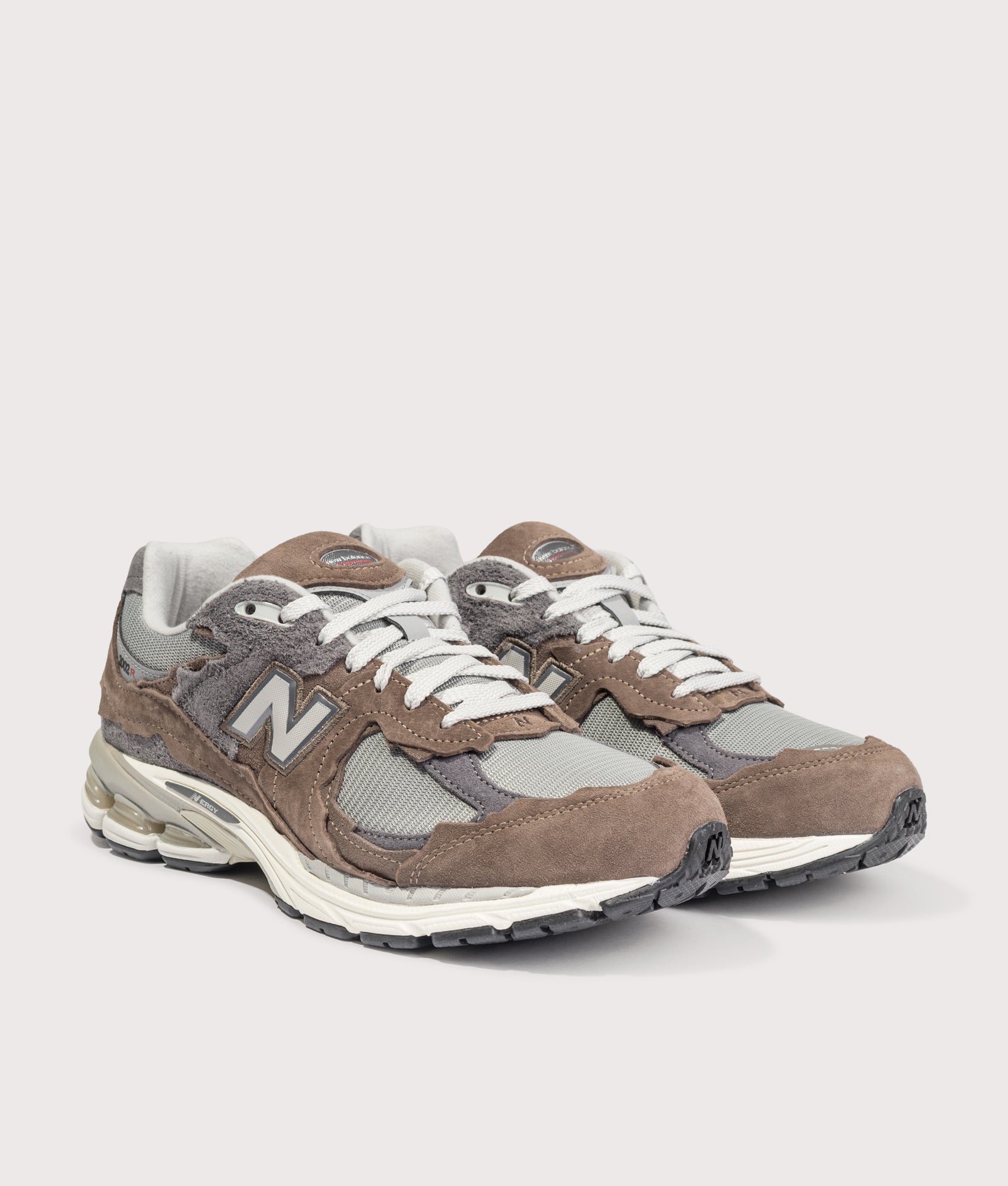 New Balance 2002D Protection Pack Sneakers in Cortado at EQVVS Menswear. Angled front shot.