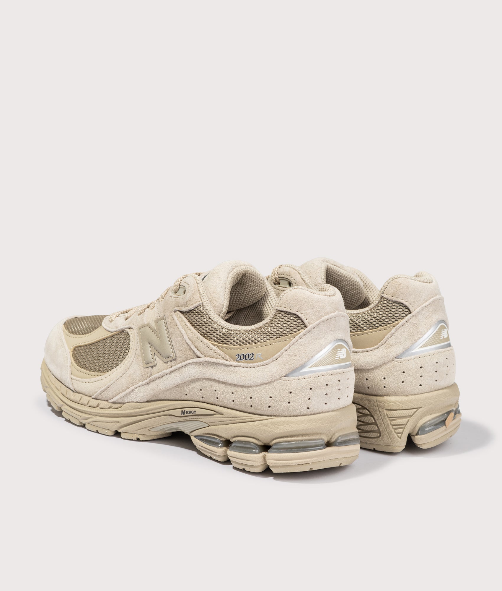 New Balance 2002R Sneakers in Stoneware at EQVVS Menswear. Angled back shot.