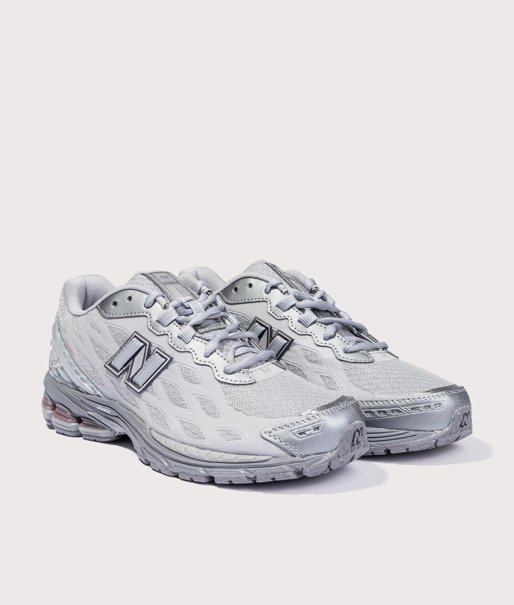 1906 Sneakers in Slate Grey/Rosewood | New Balance | EQVVS | Front angle shot 
