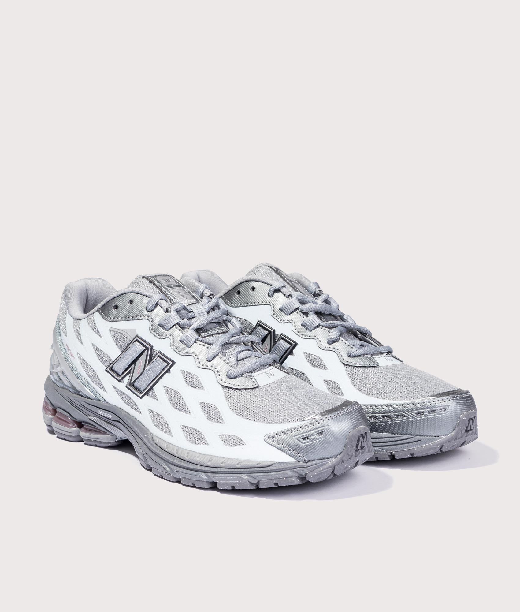 1906 Sneakers in Slate Grey/Rosewood | New Balance | EQVVS | Front angle reflective shot 