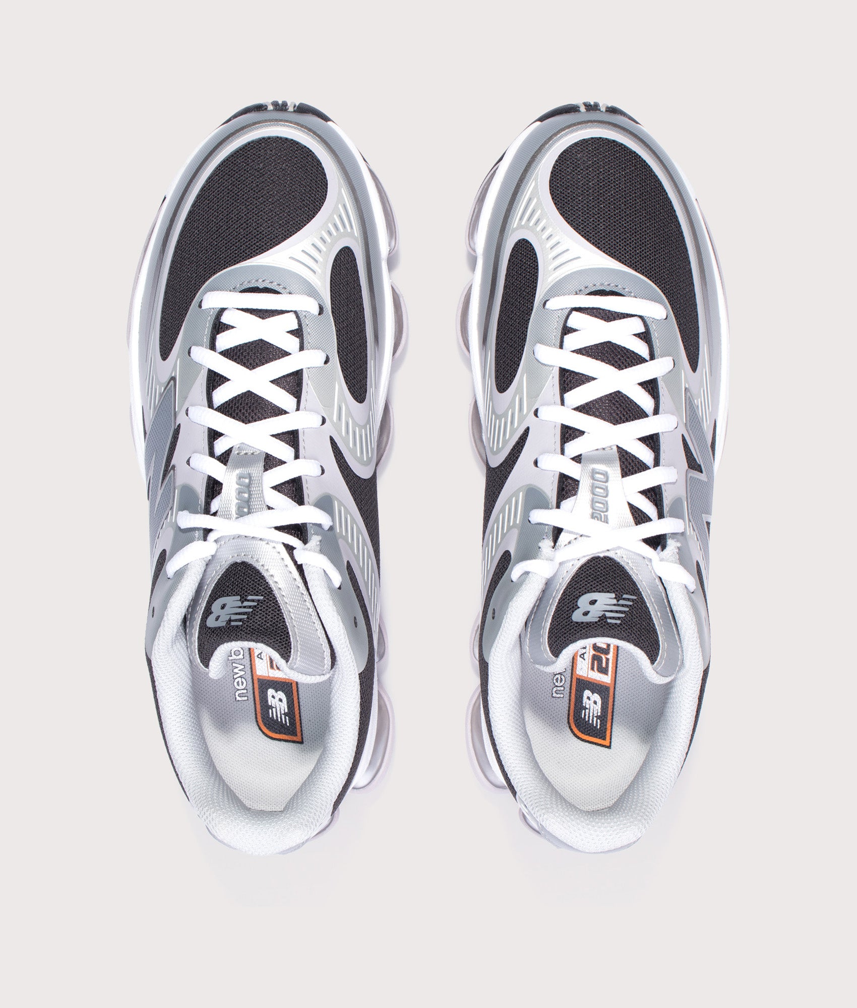 New Balance ABZORB 2000 Sneakers in Silver Metallic and Faded Black at EQVVS Menswear. Top shot.