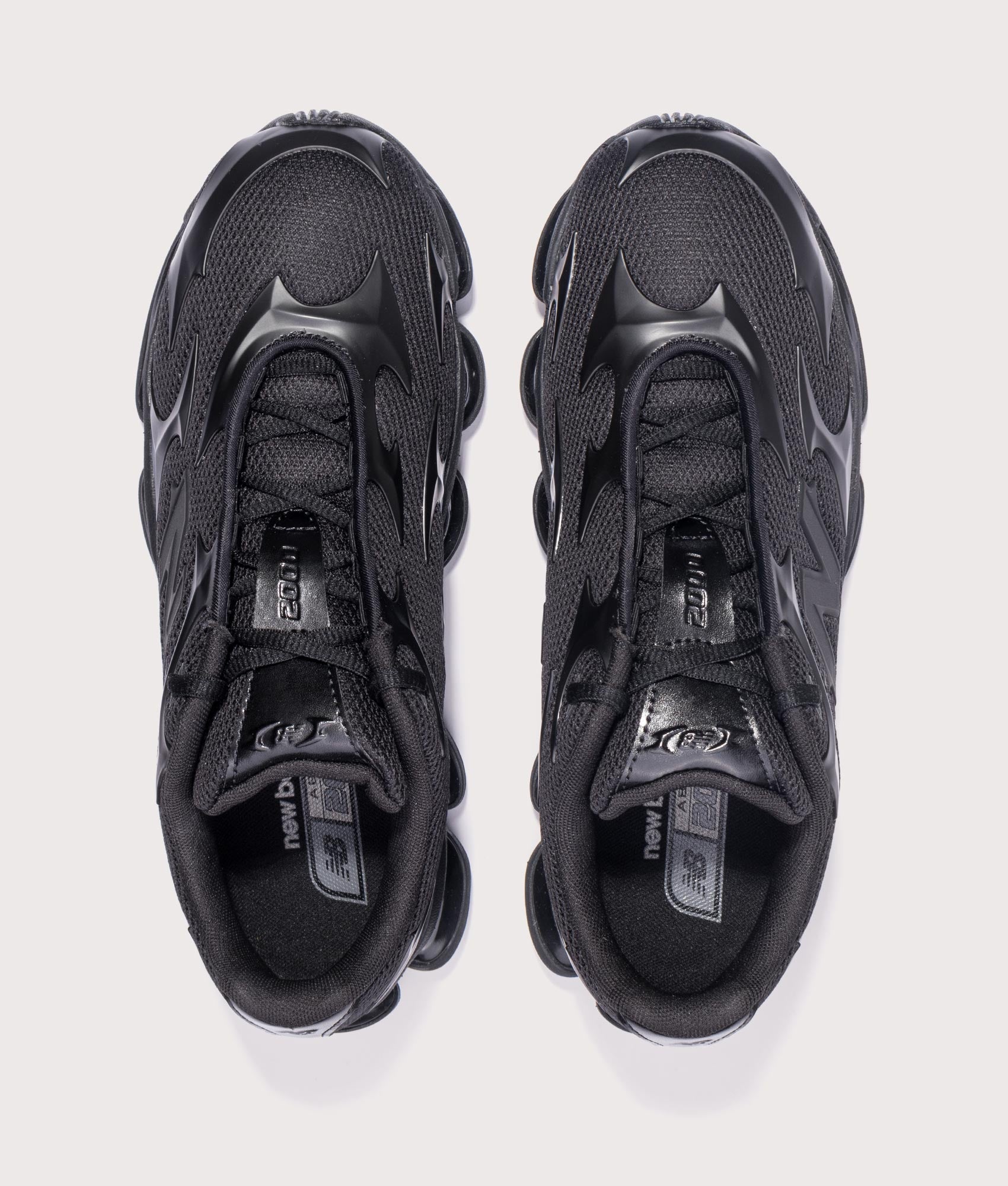ABZORB 2000 in Black Metallic | New Balance | EQVVS | Top shot 