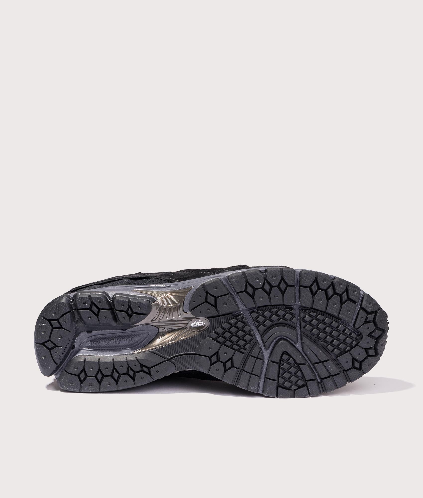 2002DX Sneakers in Black | New Balance | EQVVS | Sole shot 