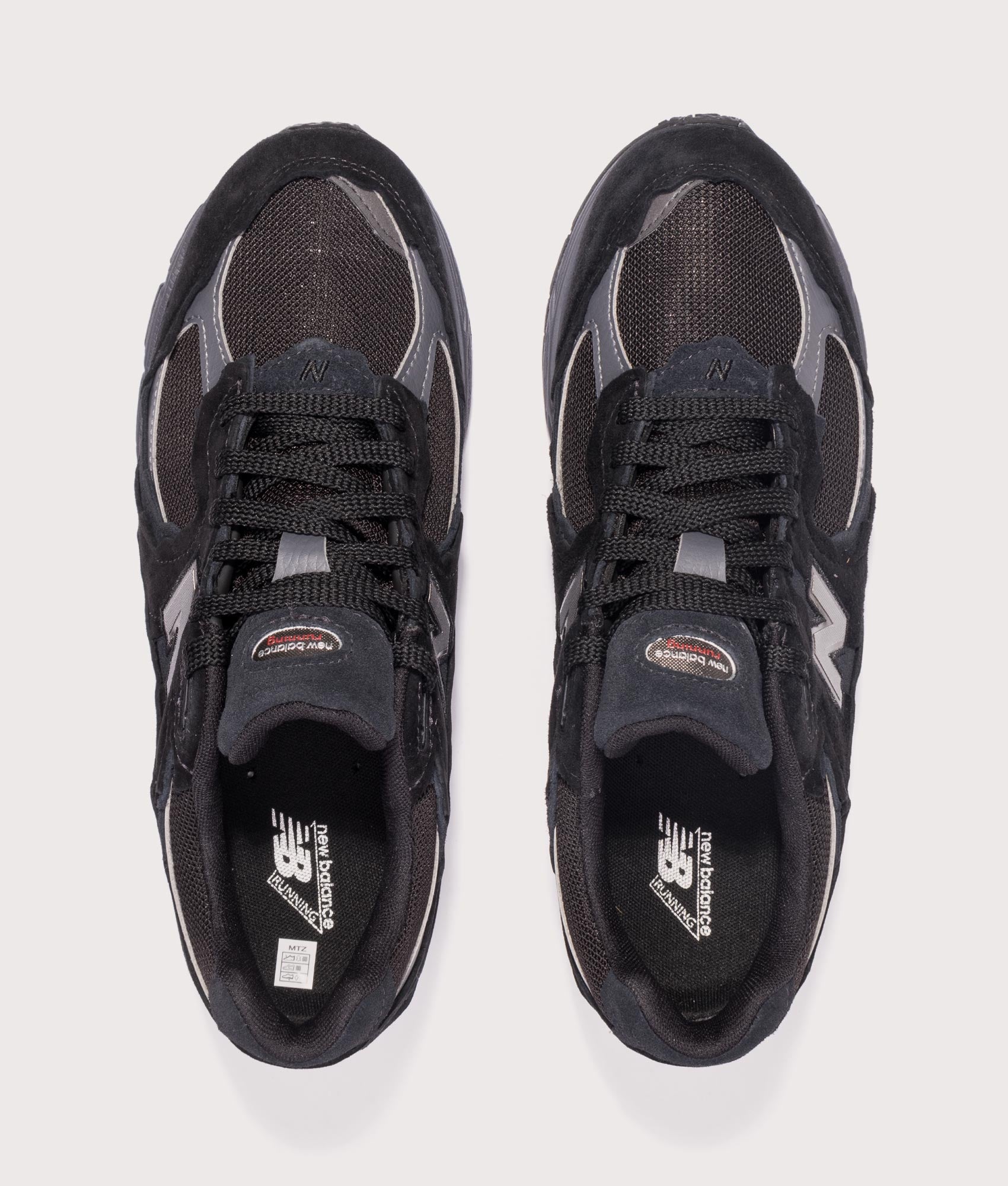 2002DX Sneakers in Black | New Balance | EQVVS | Top shot 