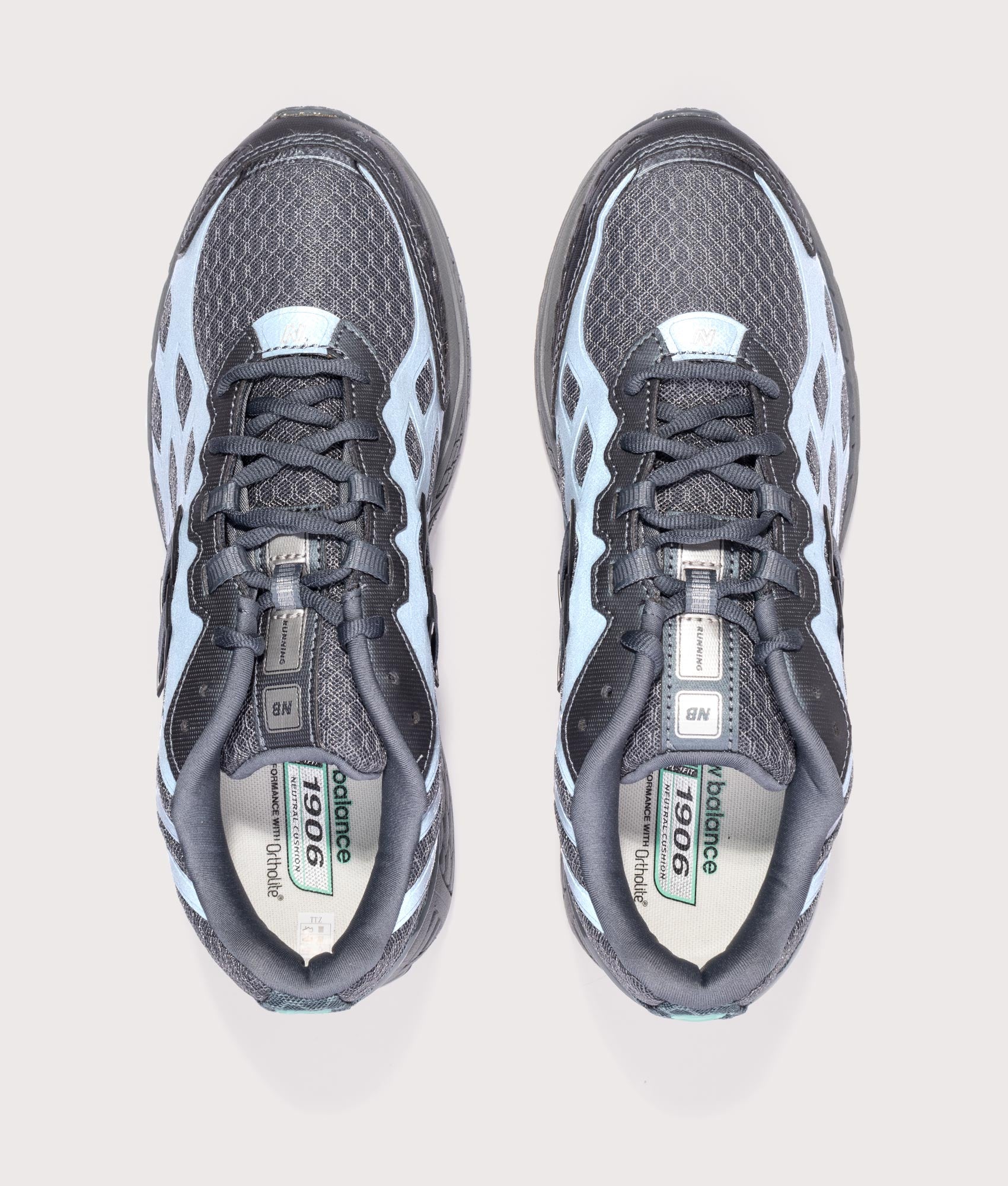New Balance 1906WV1 Reflective Sneakers in Graphite at EQVVS Menswear. Reflective top shot.