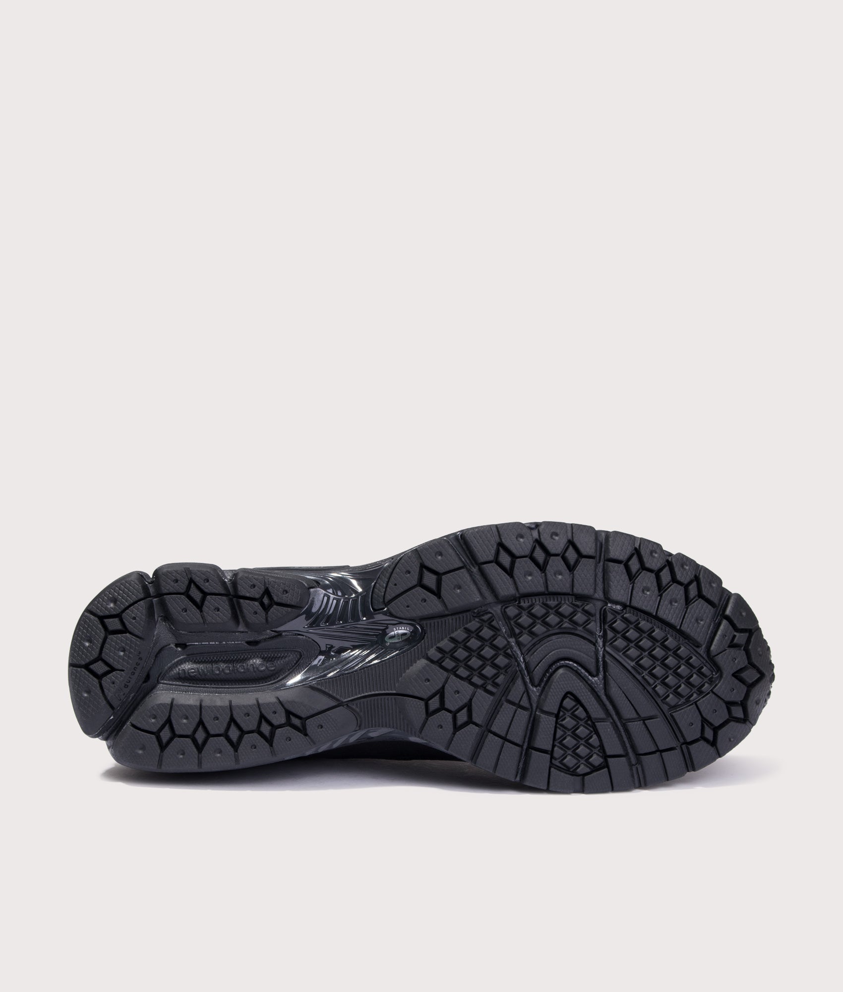 New Balance 1906X Sneakers in Black at EQVVS Menswear. Tread shot.