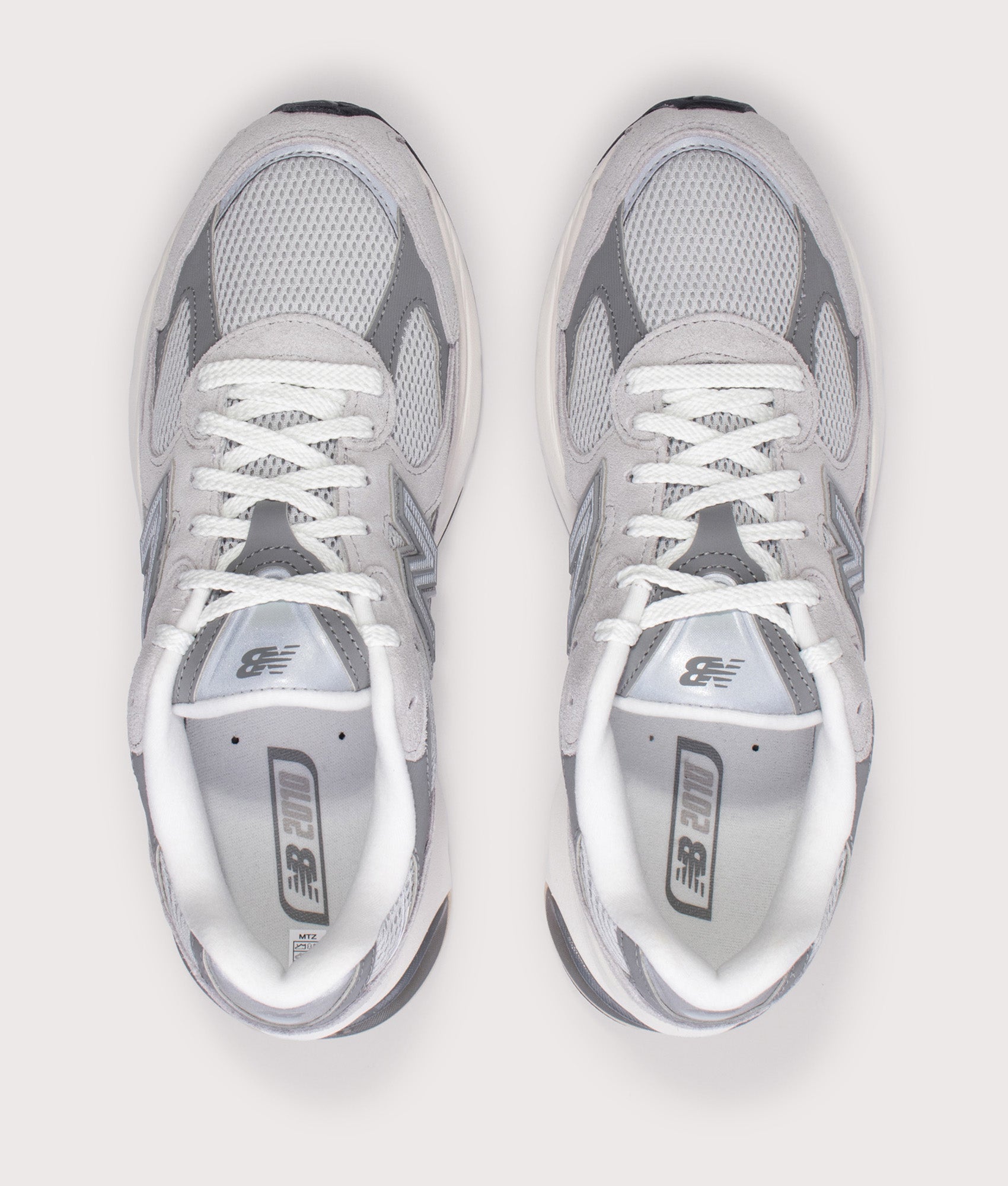 New Balance 2010 Sneakers in Raincloud and Harbor Grey at EQVVS Menswear. Top shot.