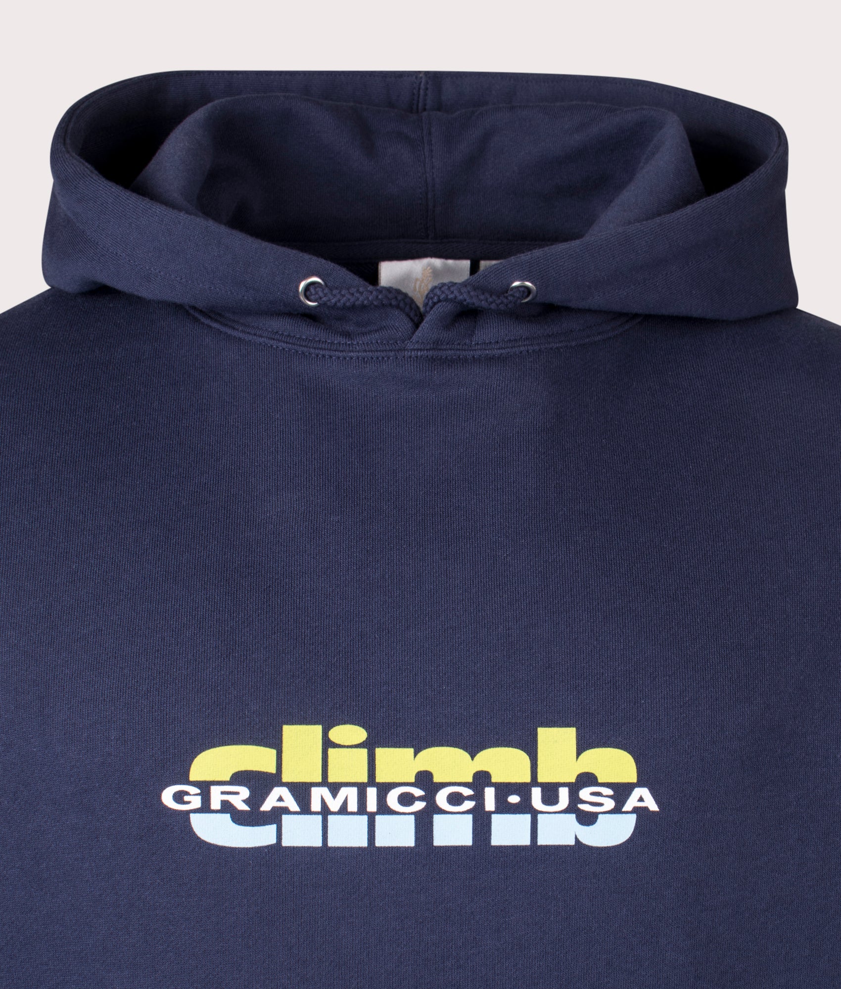 Gramicci Climb Hoodie in navy, 100% cotton at EQVVS. Detailed Logo Shot. 
