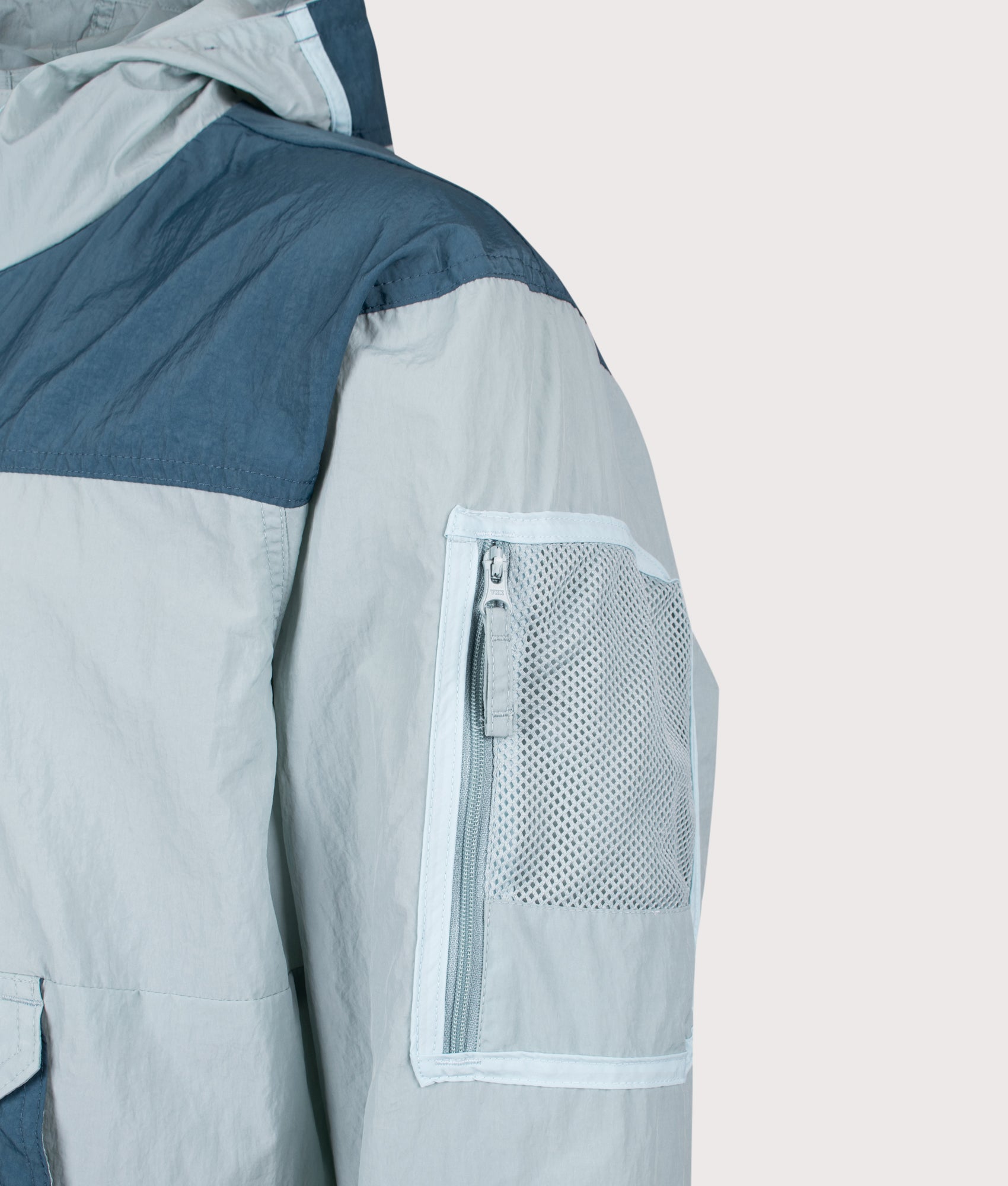 Columbia Challenger Windbreaker Anorak in Crushed Blue and Everblue at EQVVS Menswear. Second detail shot.